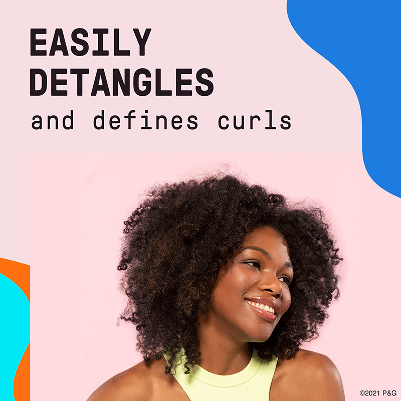 Easily Detangles and defines curls. Black woman with curly hair