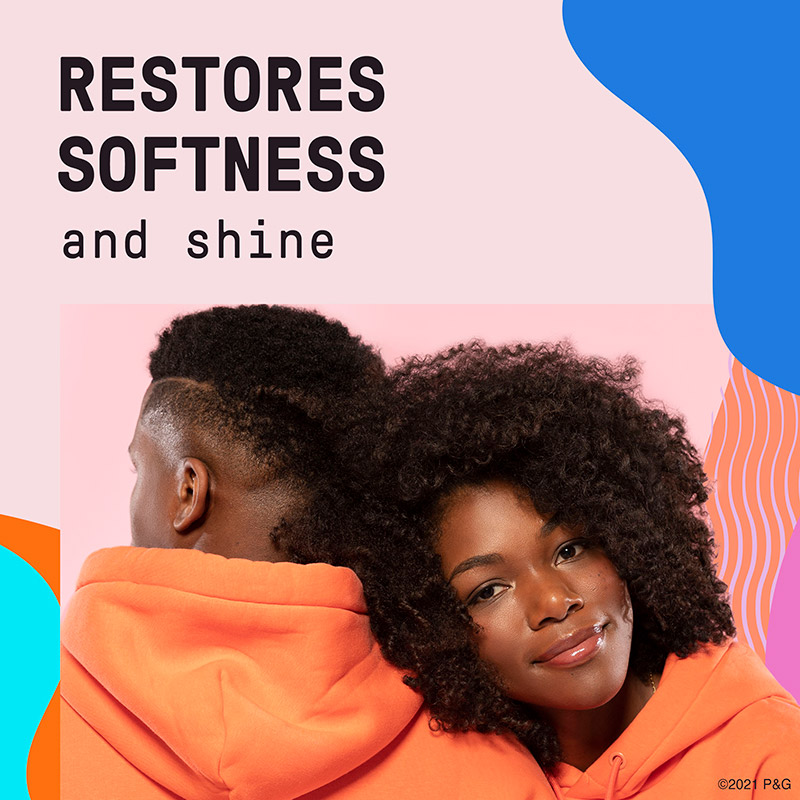 Restores softness and shine. Black man and woman with curly hair.