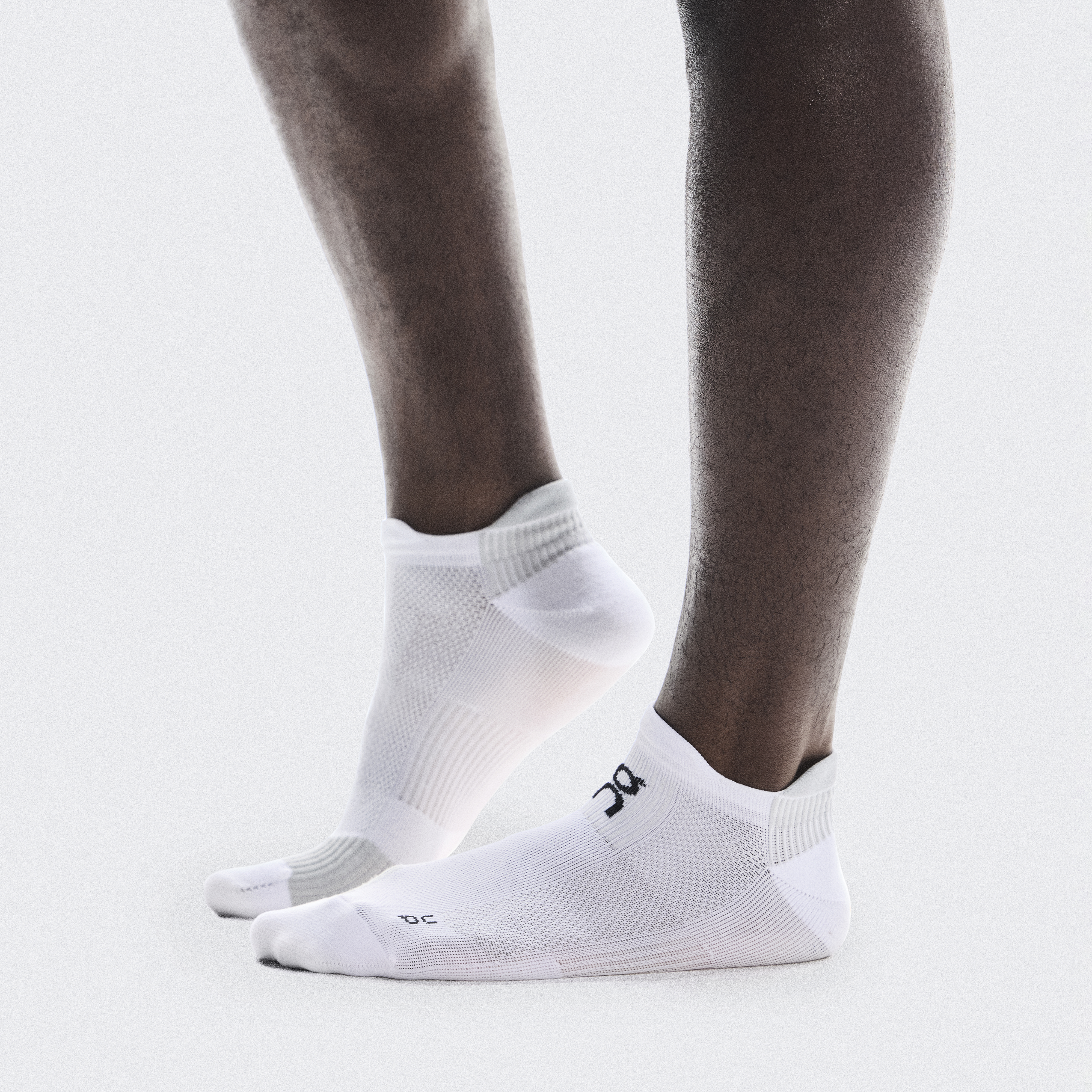 Performance Run Sock Low in White/Glacier