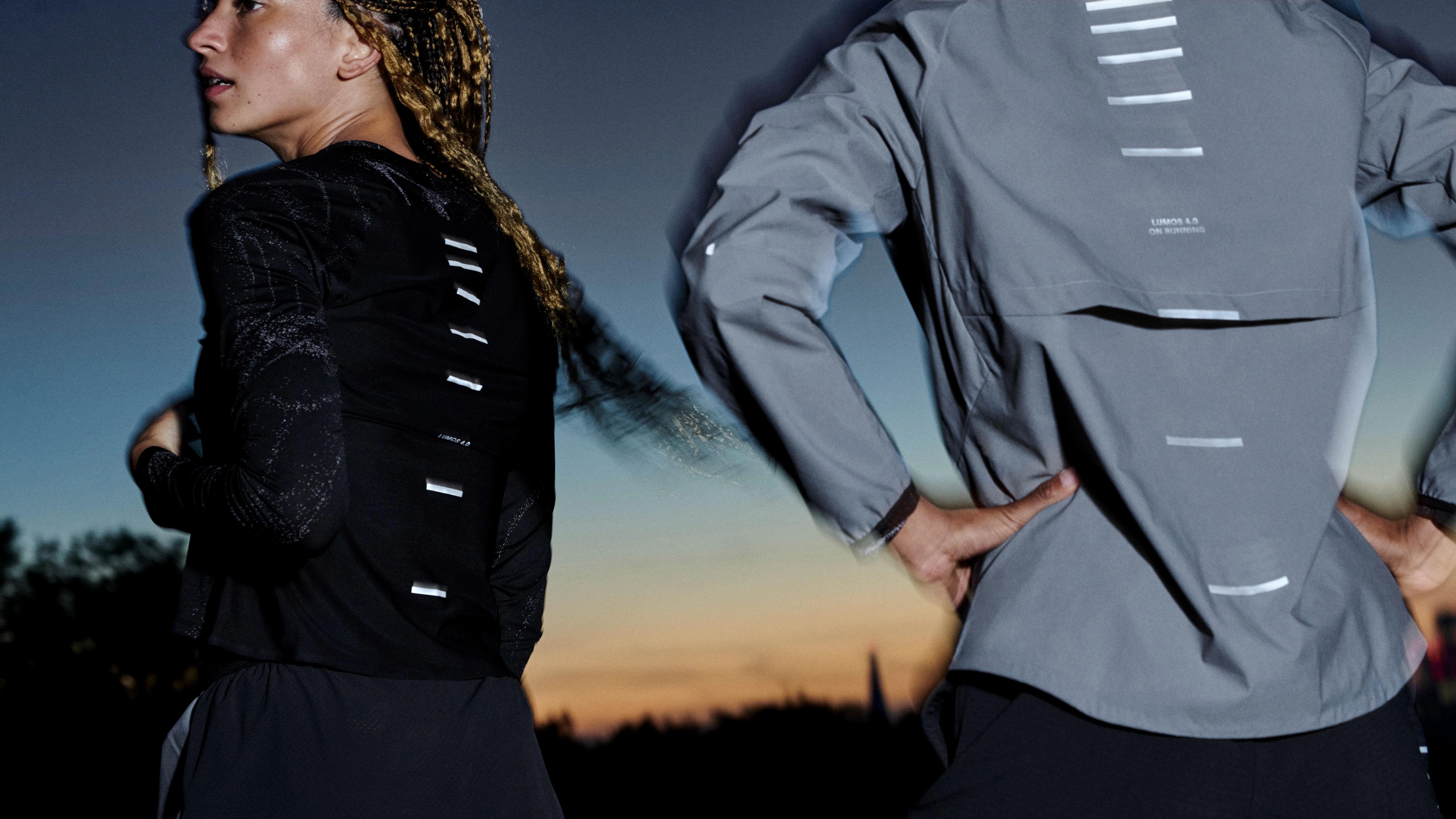 Two women standing outside showing their On apparel from behind.