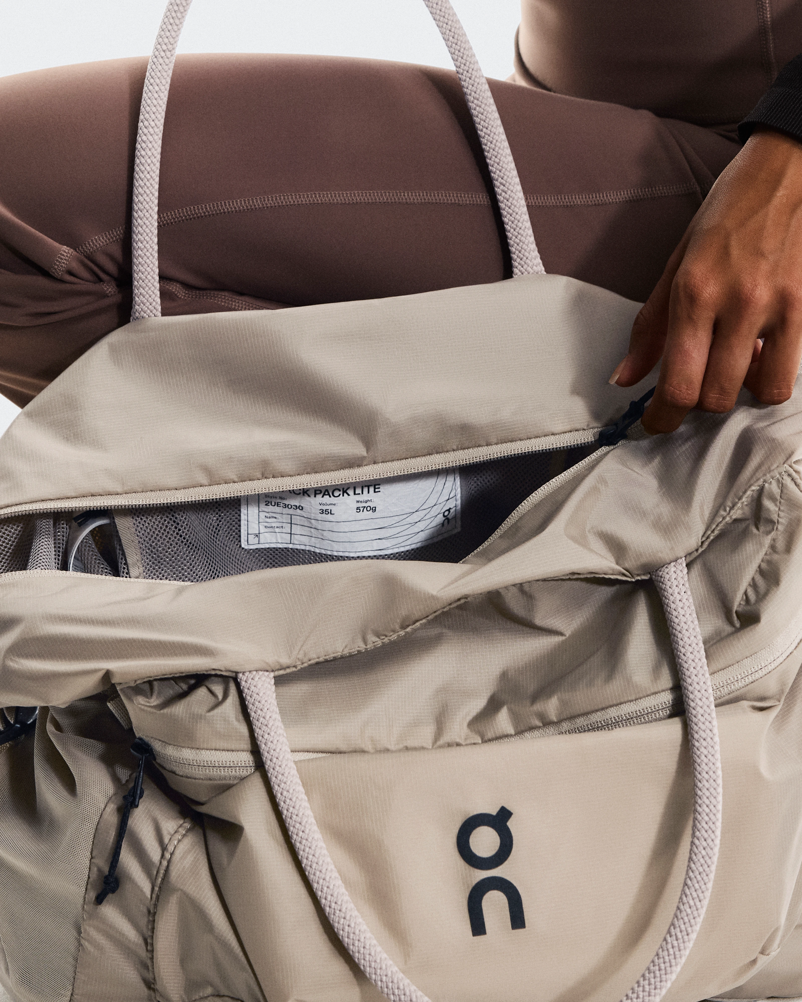 On Track Pack 35L Lite Sand Unisex Bags