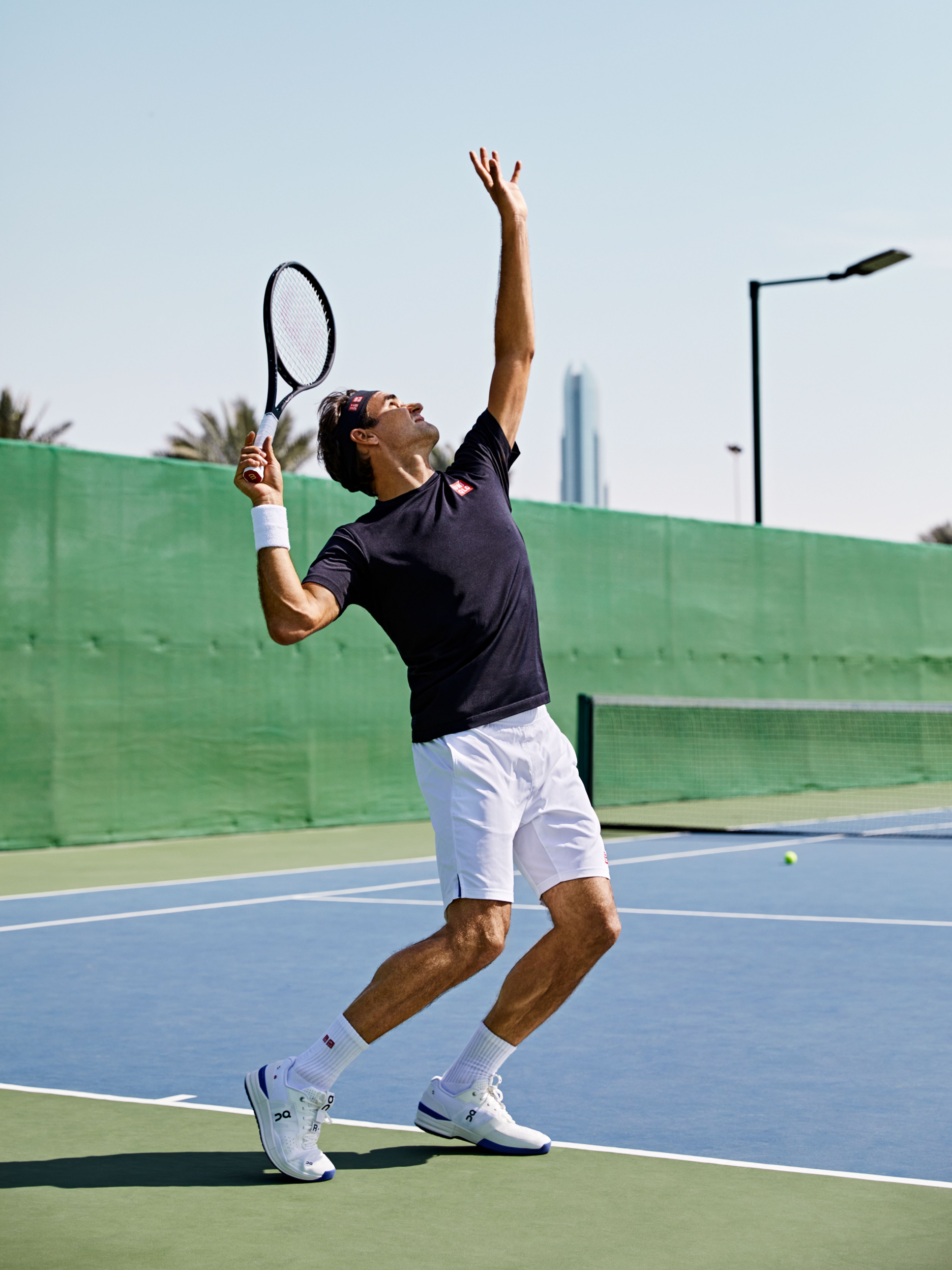 Roger Federer serving roger pro tennis court