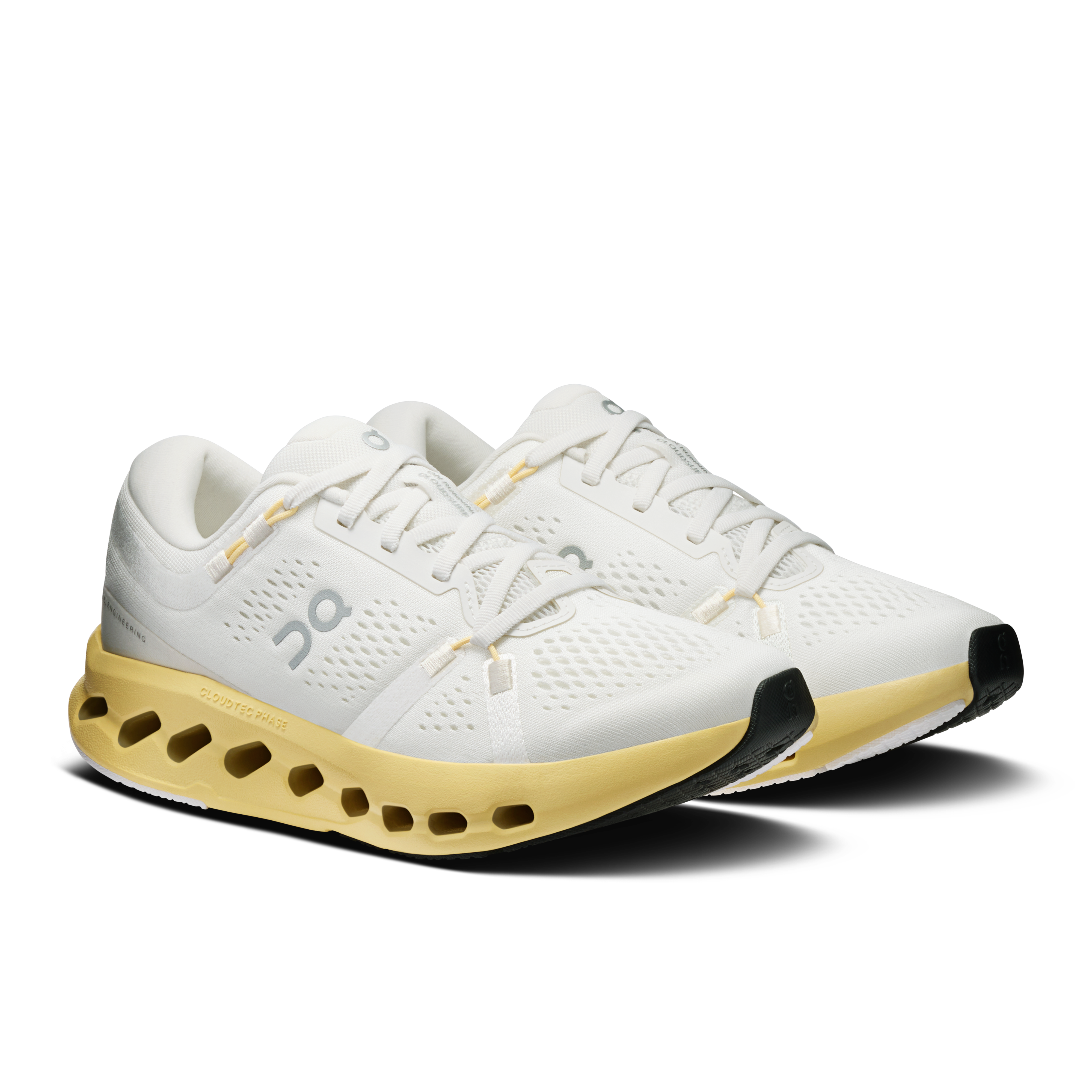 On Cloudsurfer 2 Ivory & Dijon Feminino Corrida de rua Tênis