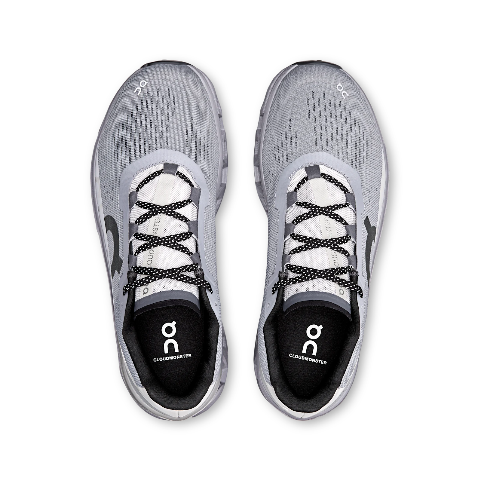 Top view of On Cloudmonster running shoes showing the laces and insole