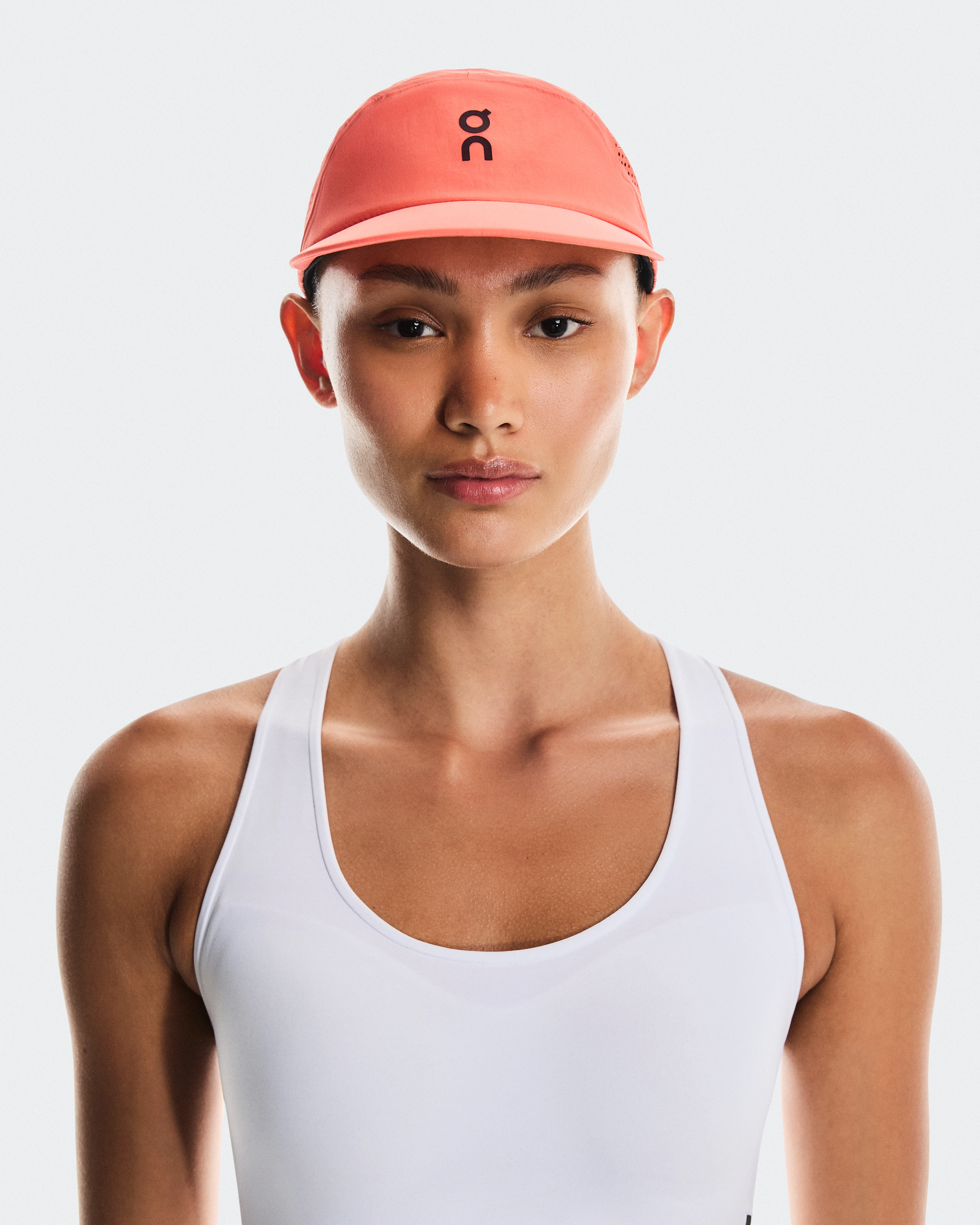 On Performance Cap Salmon Unisex Headwear