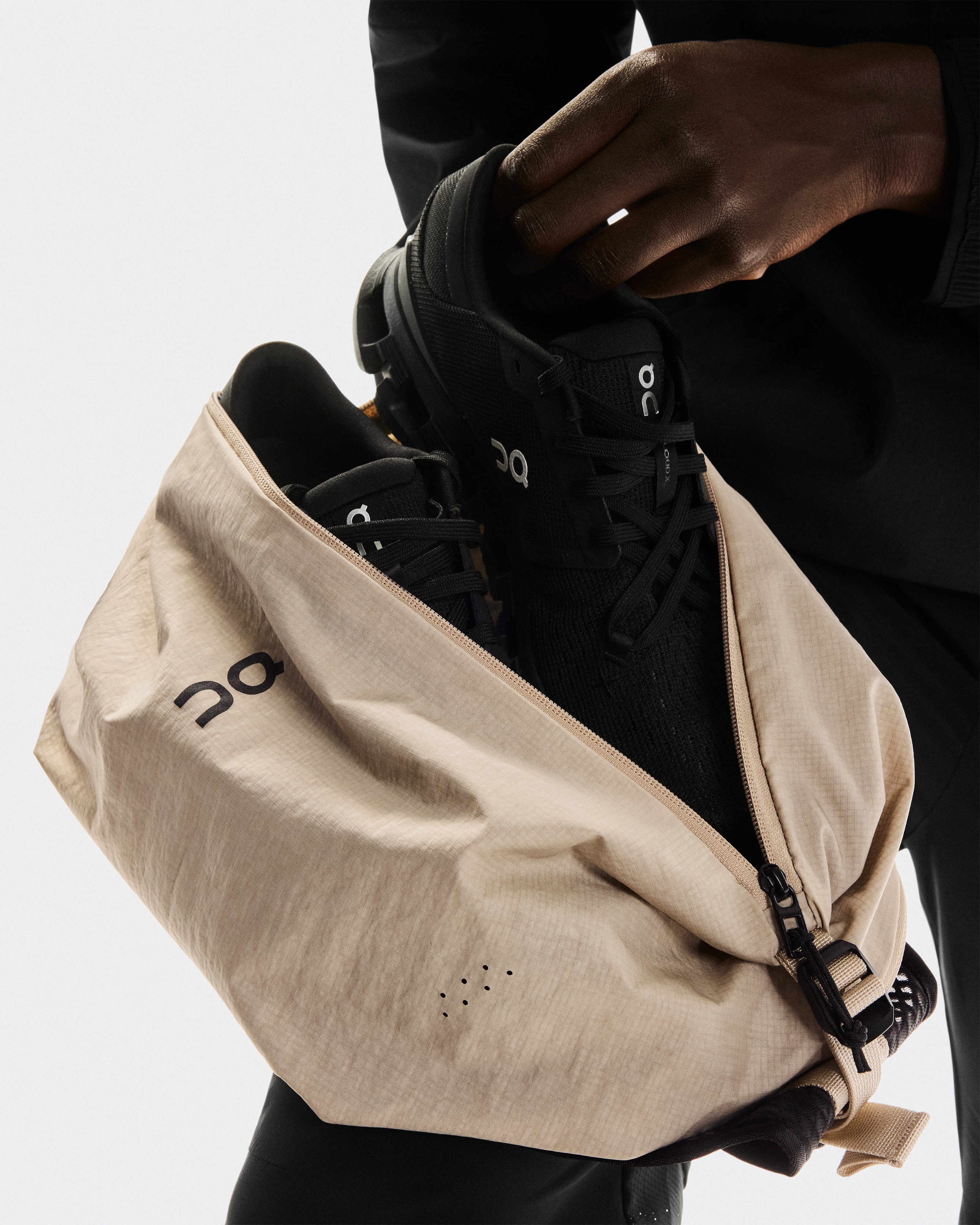 On Sling Pack 9L Sand & Black Unisex Bags