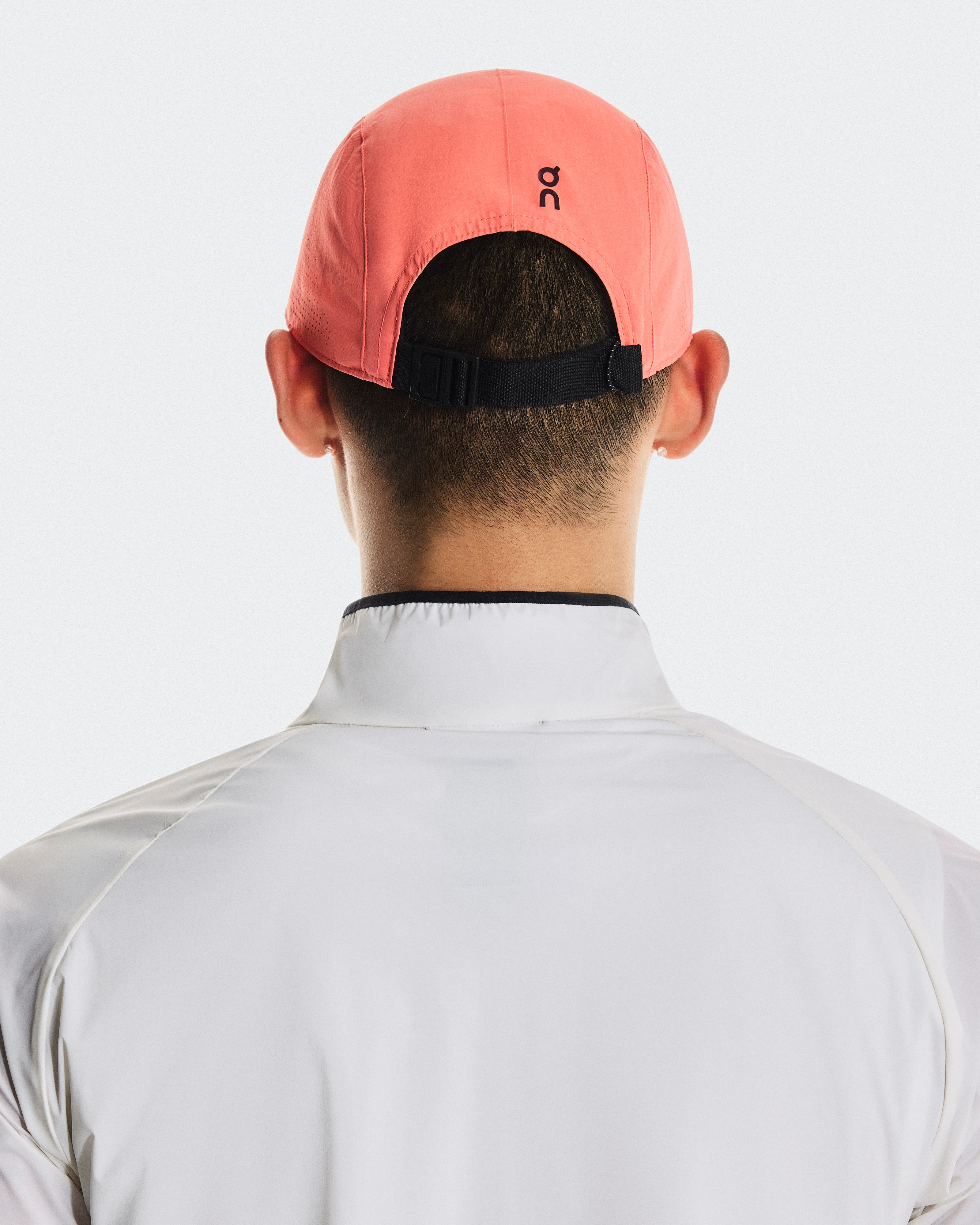 On Performance Cap Salmon Unisex Headwear