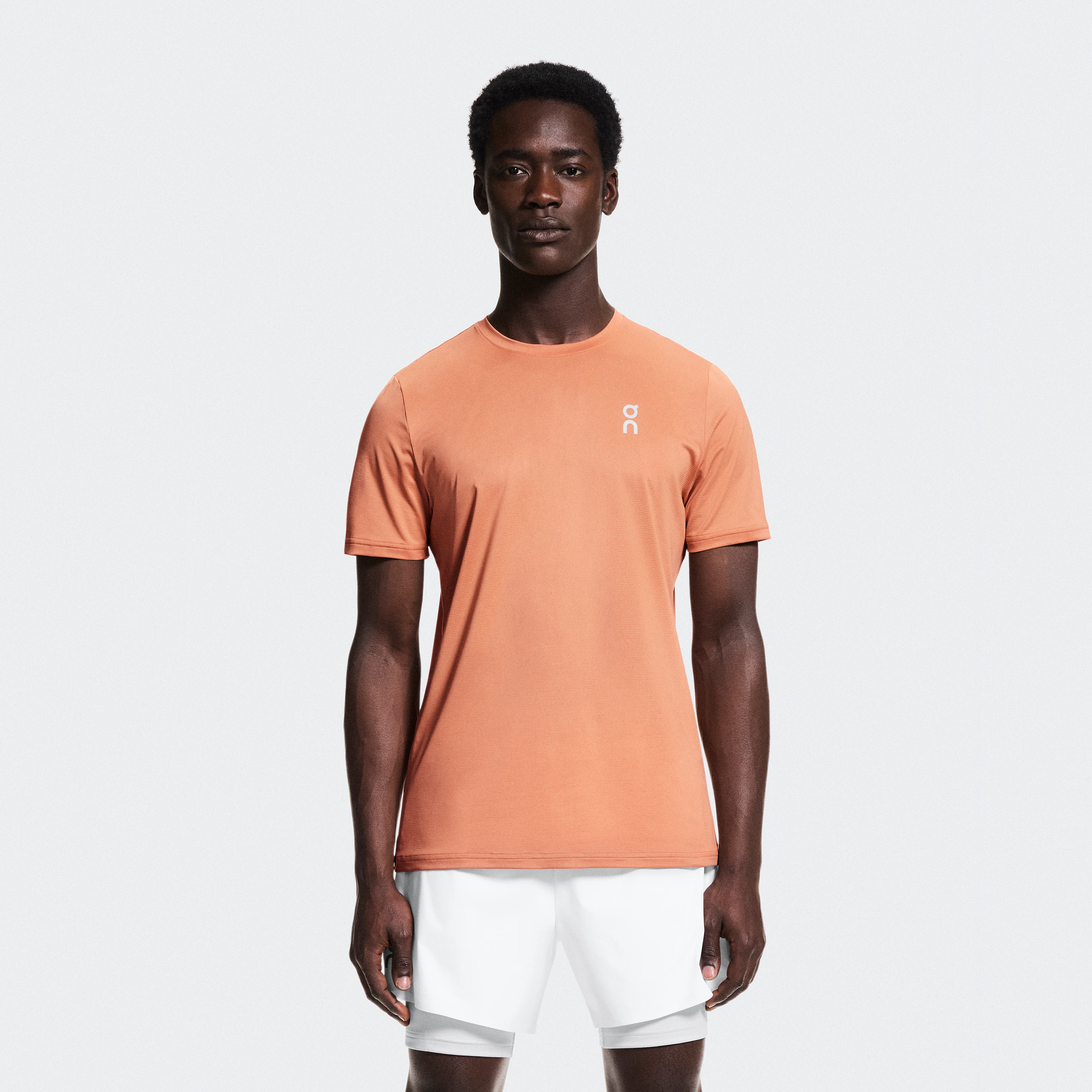On Core-T Sandstone Hombre – Ligera, versátil, running Camisetas
