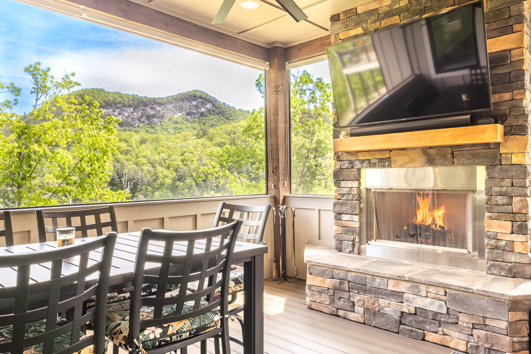 Completed Sundog Homes custom outdoor patio with fireplace for the Jebbett family in Tuckasegee's Bear Lake Reserve community. 