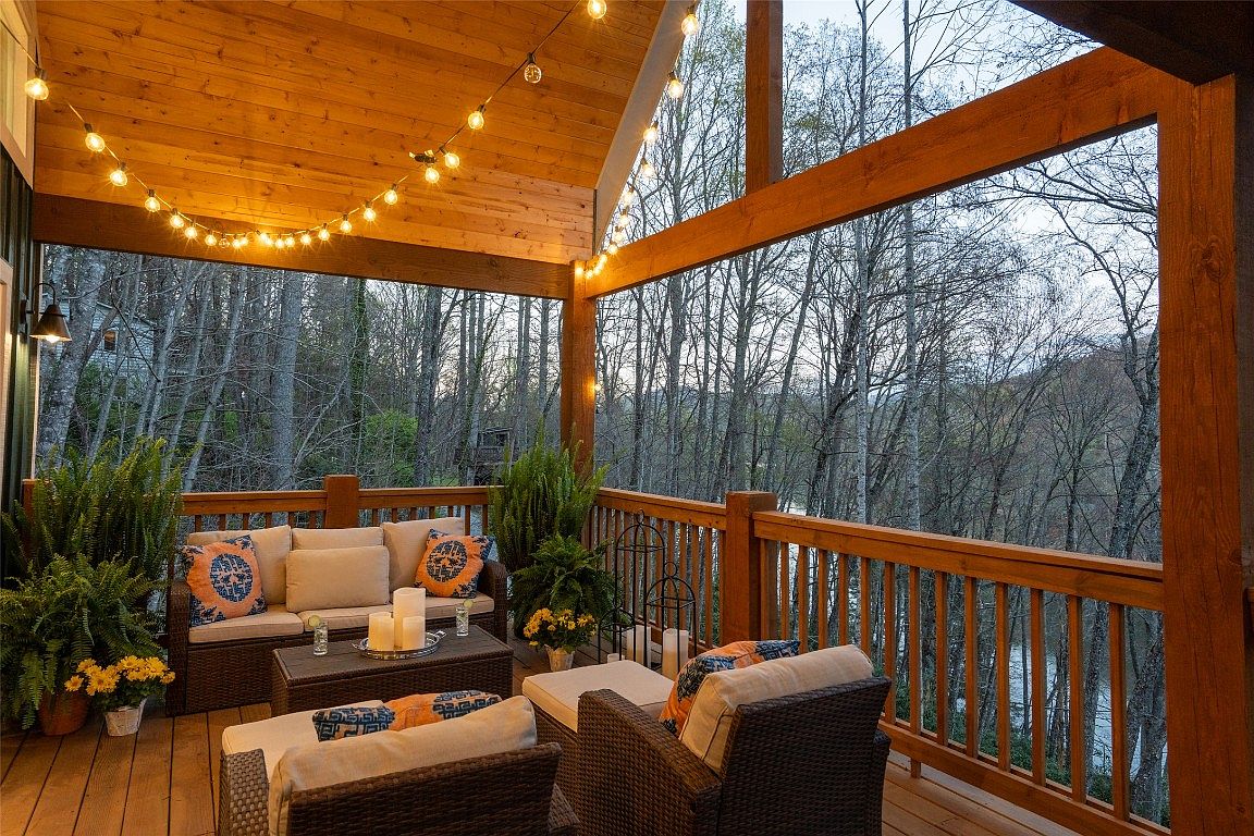 The porch of the Aaronson home in Cashiers on Lake Glenville.