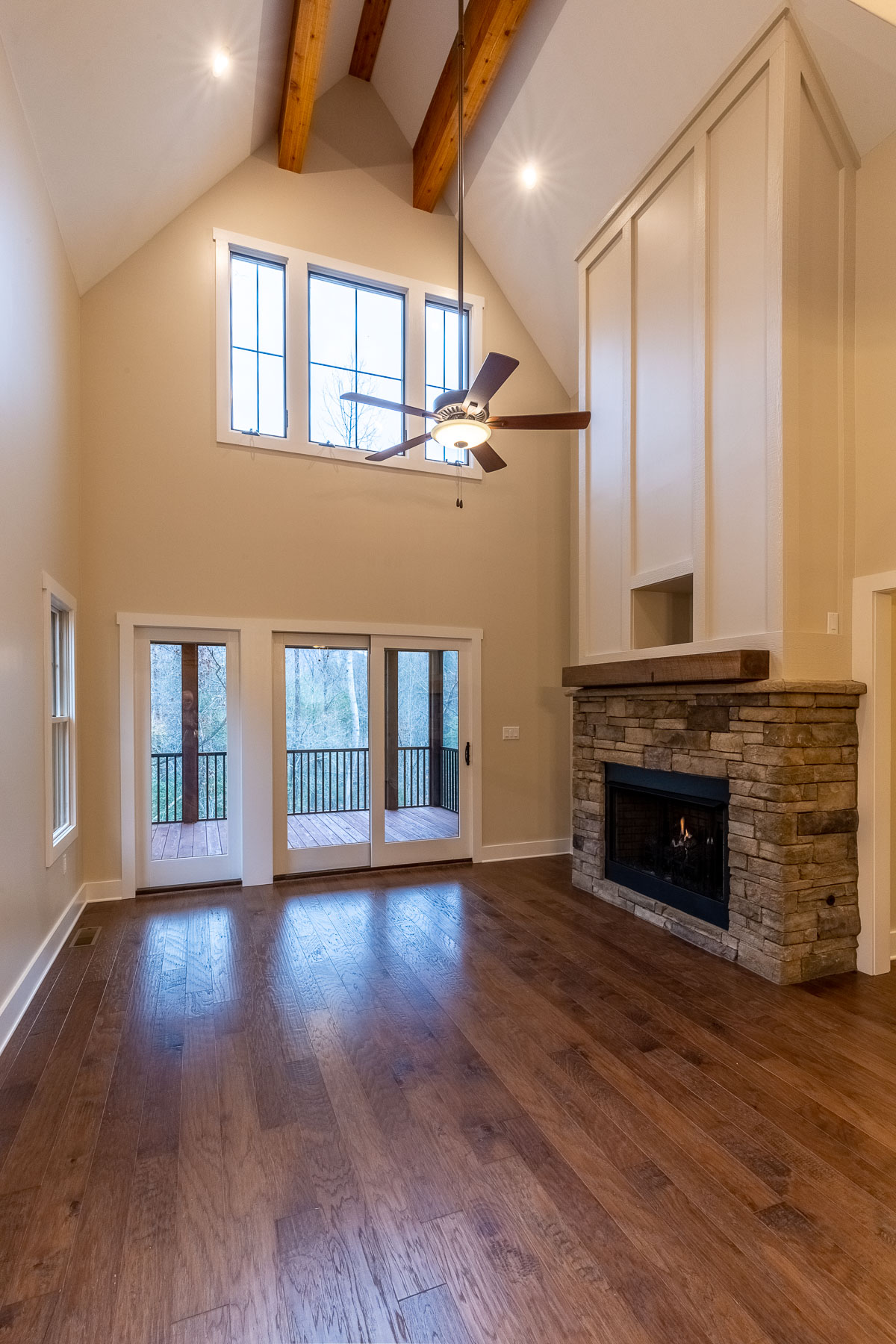 The open first floor, facing the back deck, at the Geiger residence in Cullowhee, NC.