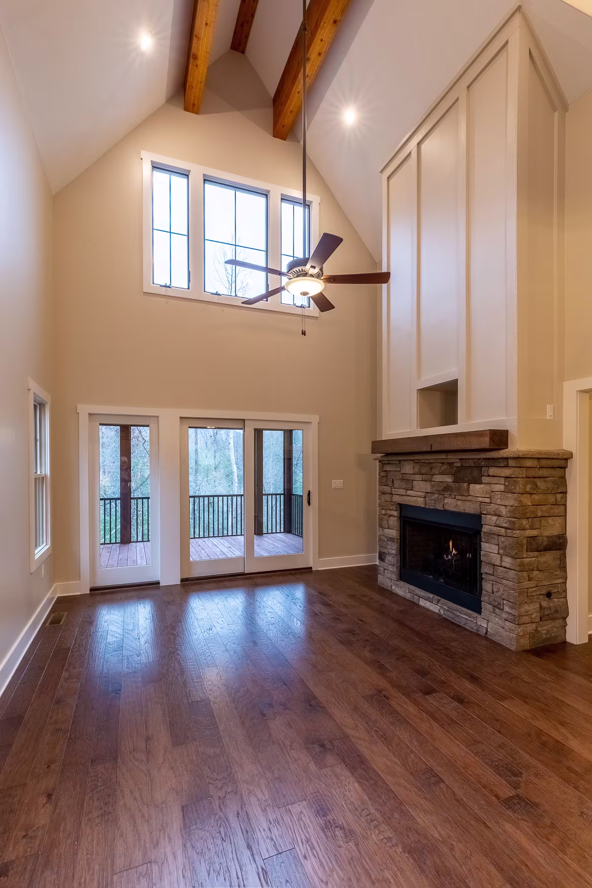 The open first floor, facing the back deck, at the Geiger residence in Cullowhee, NC.