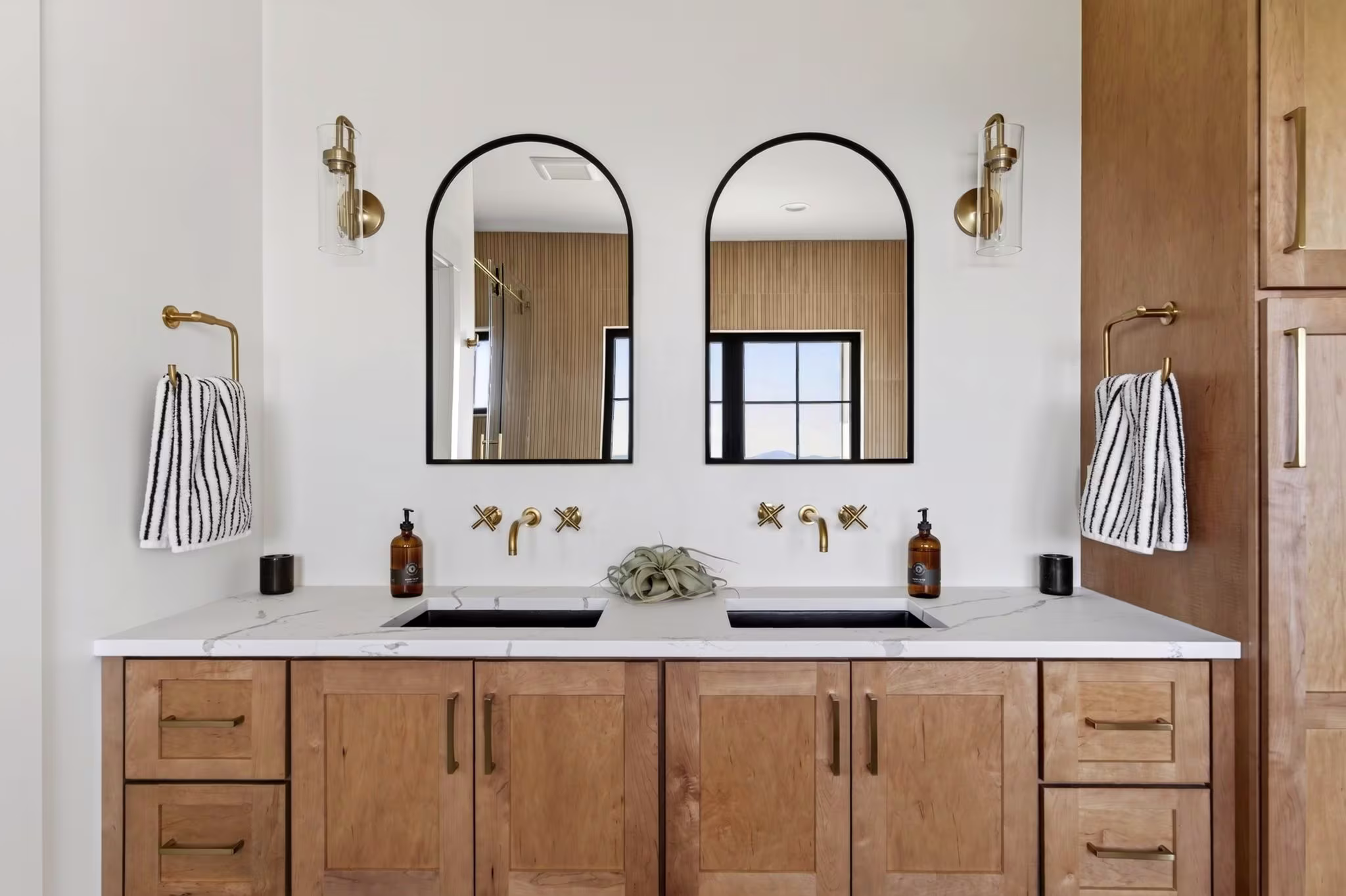 The his and her sinks in the primary bathroom of the Garbarino home.