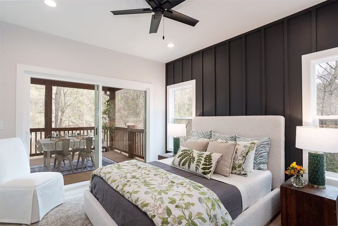 The master bedroom in the Aaronson home in Cashiers on Lake Glenville.