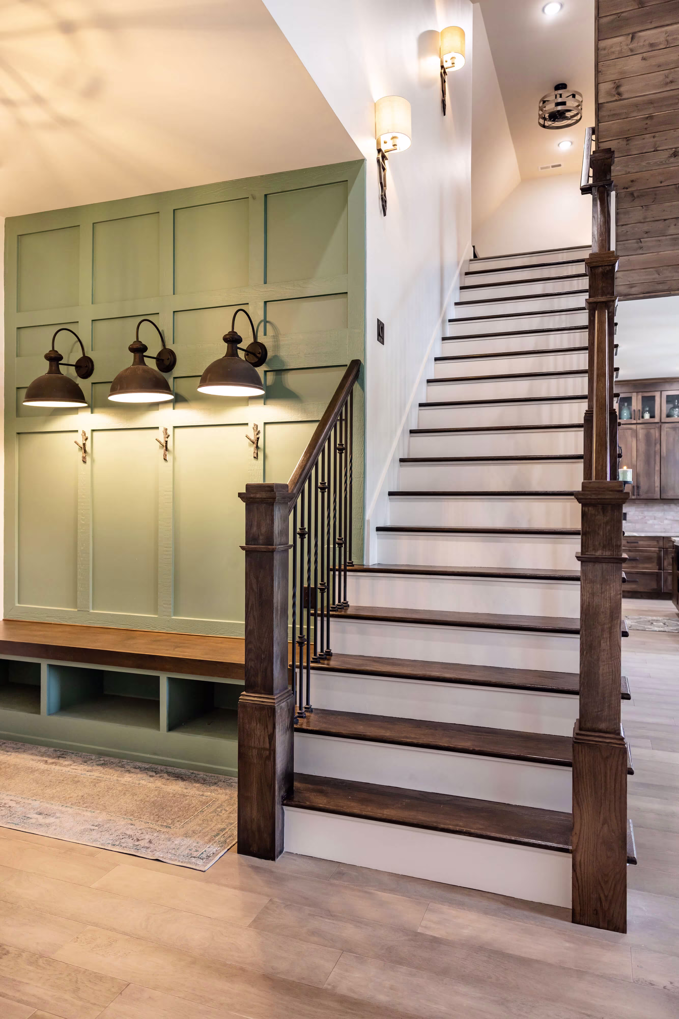 We built this custom entryway for the clients, as well as the stairs. 