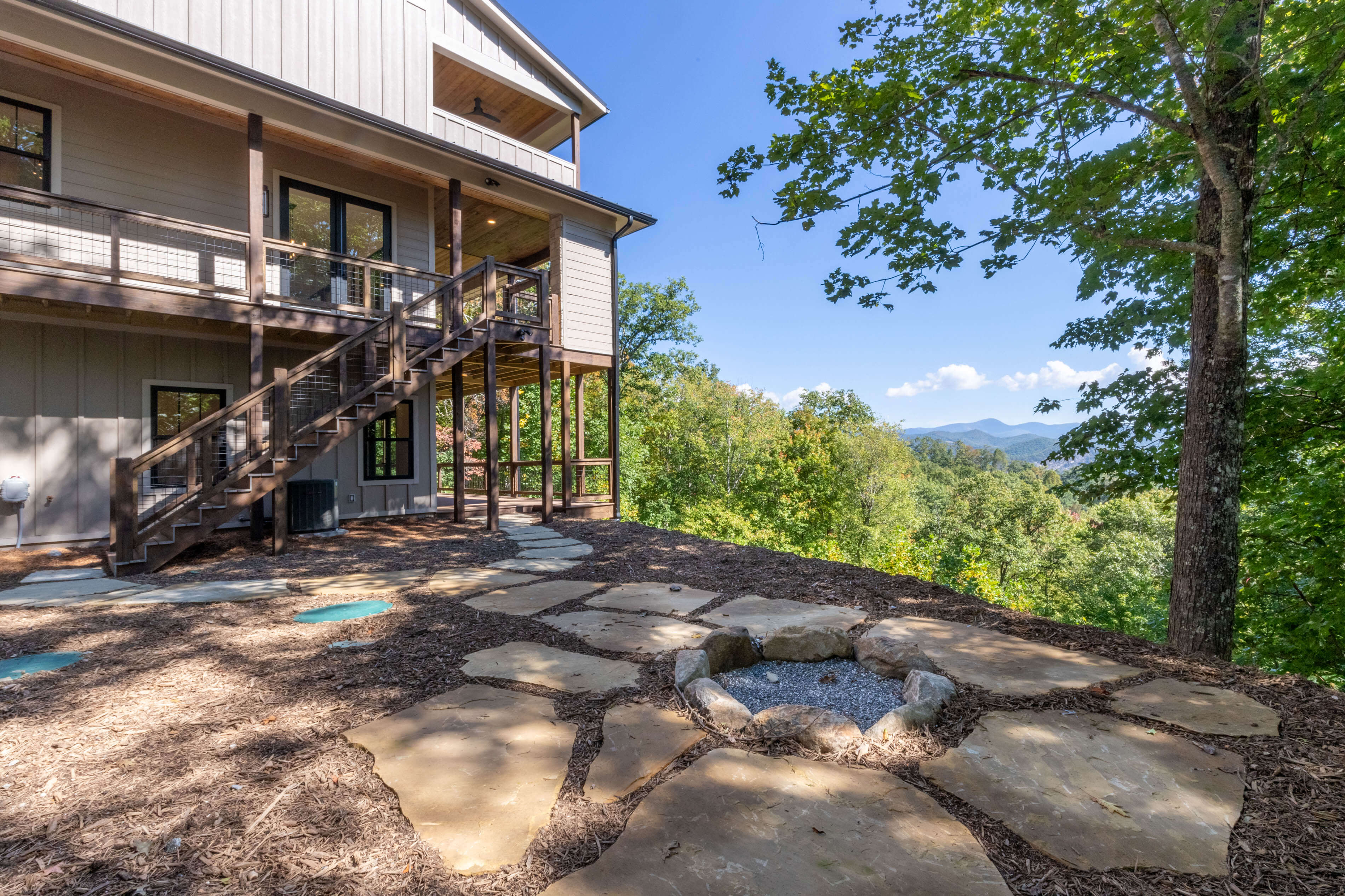 Sill backyard landscaping with view