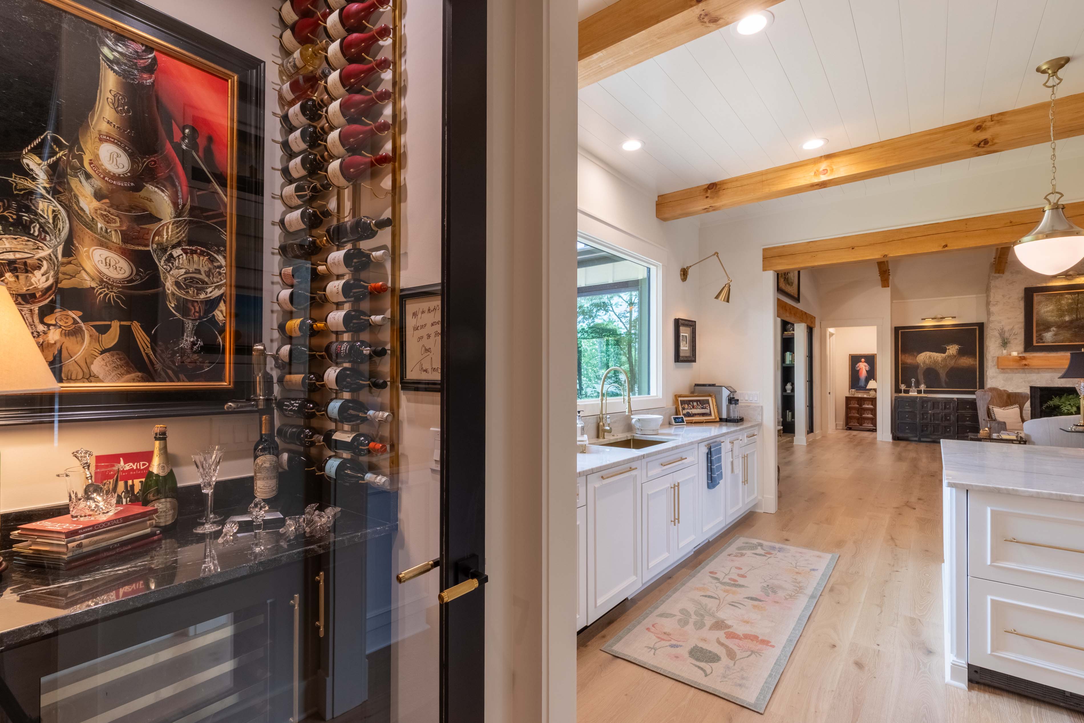 View of the kitchen from the wine room in the Flemming home in Glenville, NC