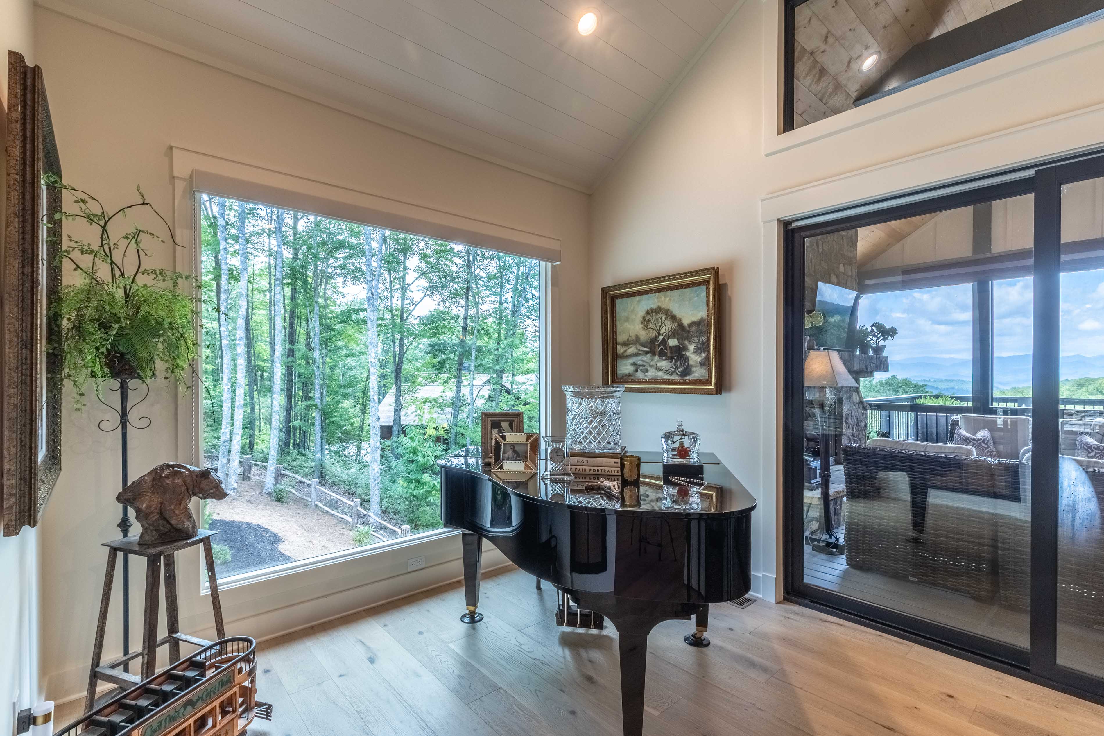 Room with a view and a piano in the Flemming home in Glenville, NC.