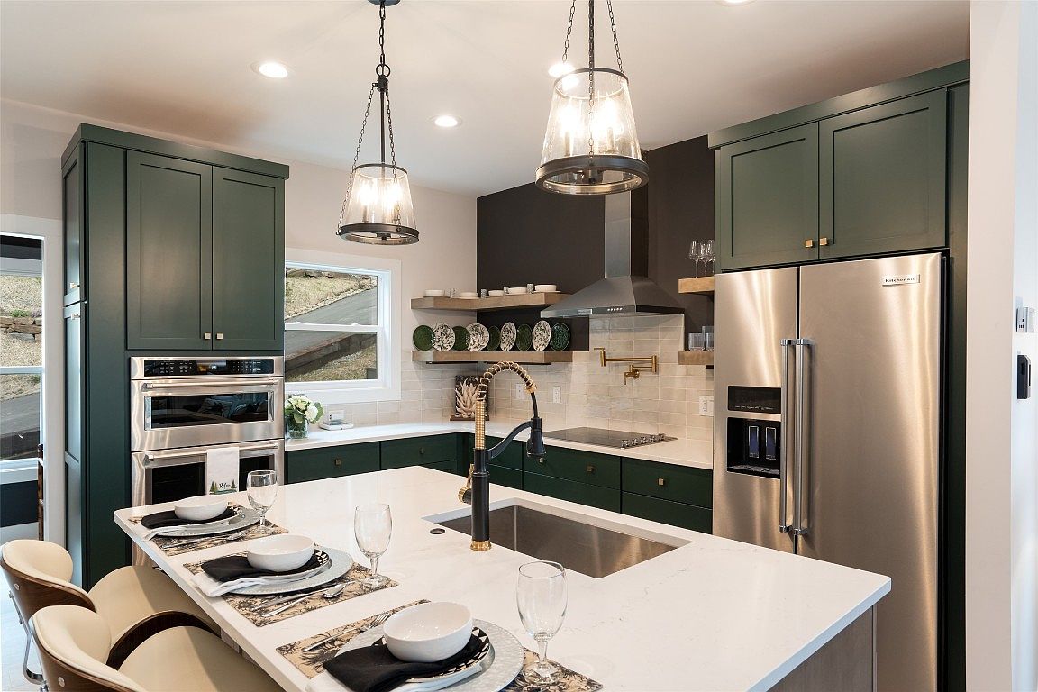 The kitchen island of the Aaronson home in Cashiers on Lake Glenville.