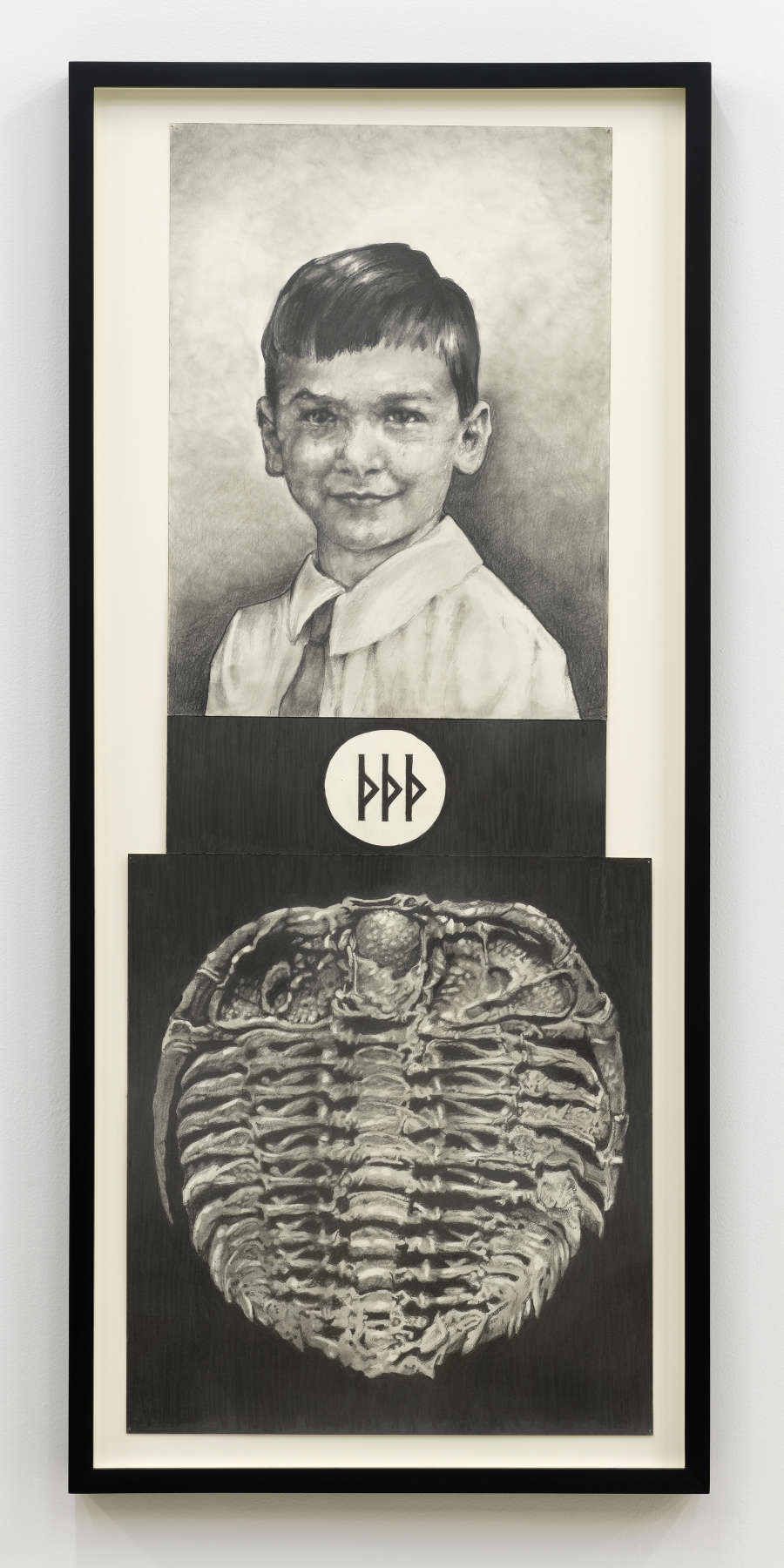 A framed graphite drawing of a small child placed on top of a trilobite.
