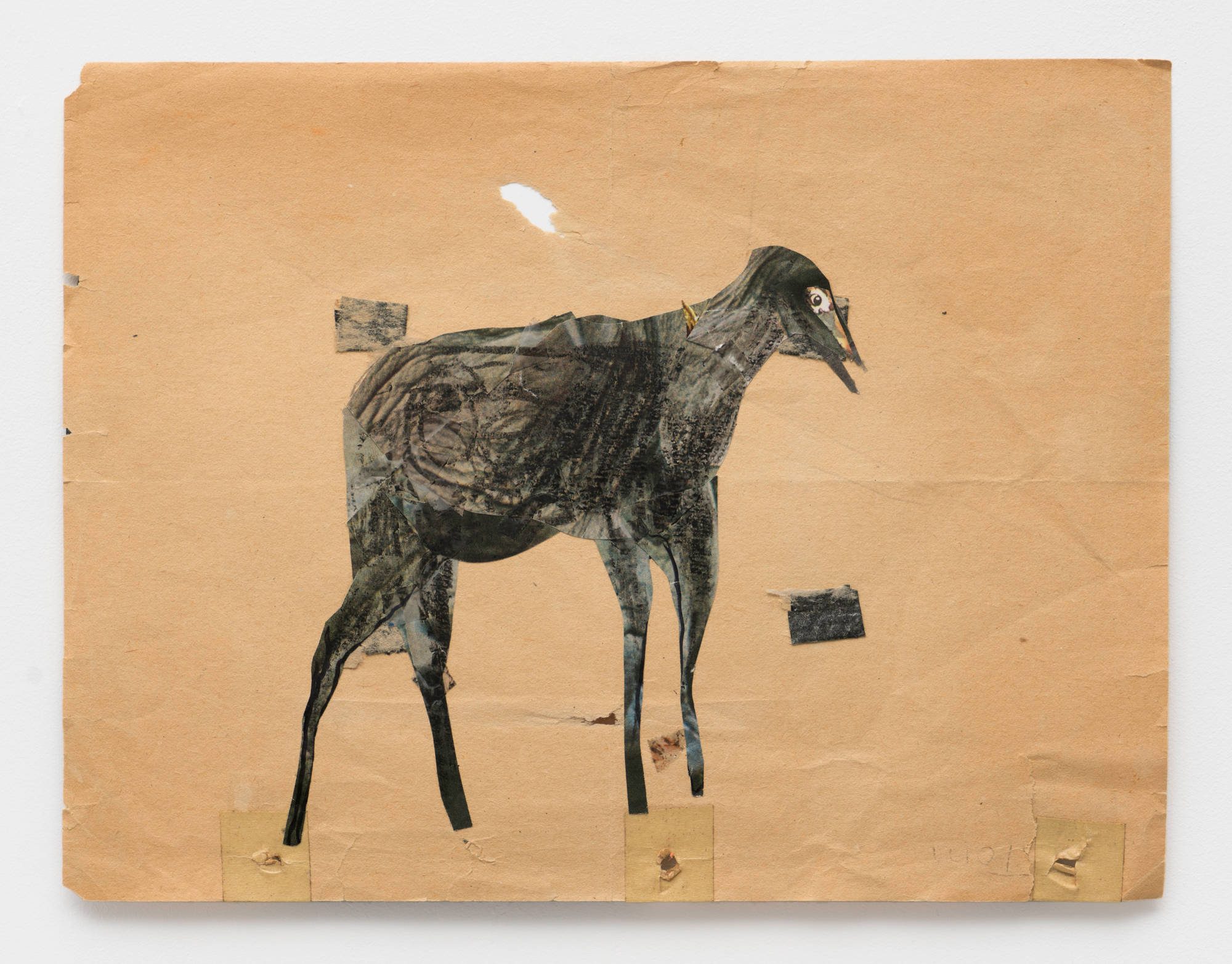 A collage on paper of a abstract mammal cut from pages of a magazine, scribbled with crayon, and mounted to a faded sheet of brown construction paper.