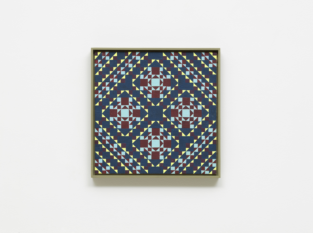 A colorful, intricate grid painting installed on a white wall.