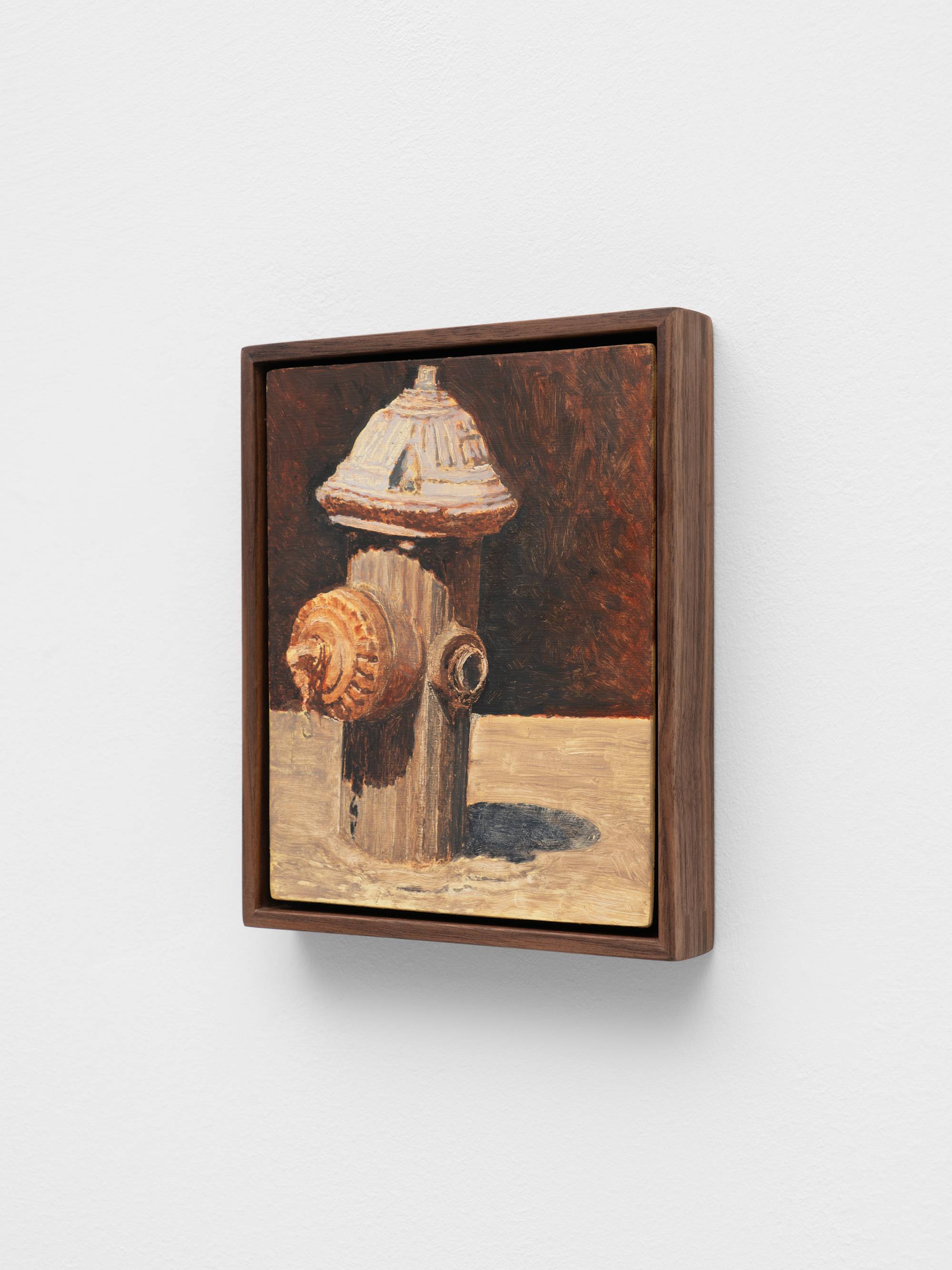 A small, dark wood framed painting of a fire hydrant in muted brown tones.