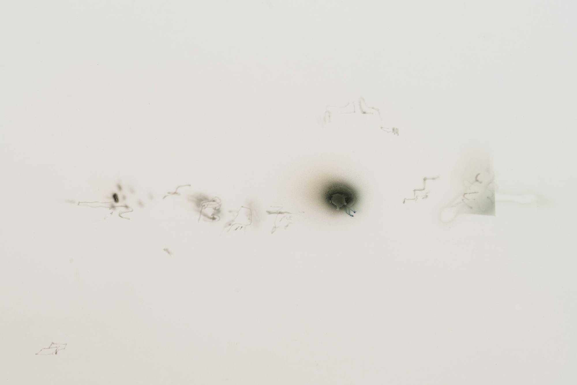 A close-up shot of a series of airbrush marks in an abstract painting.