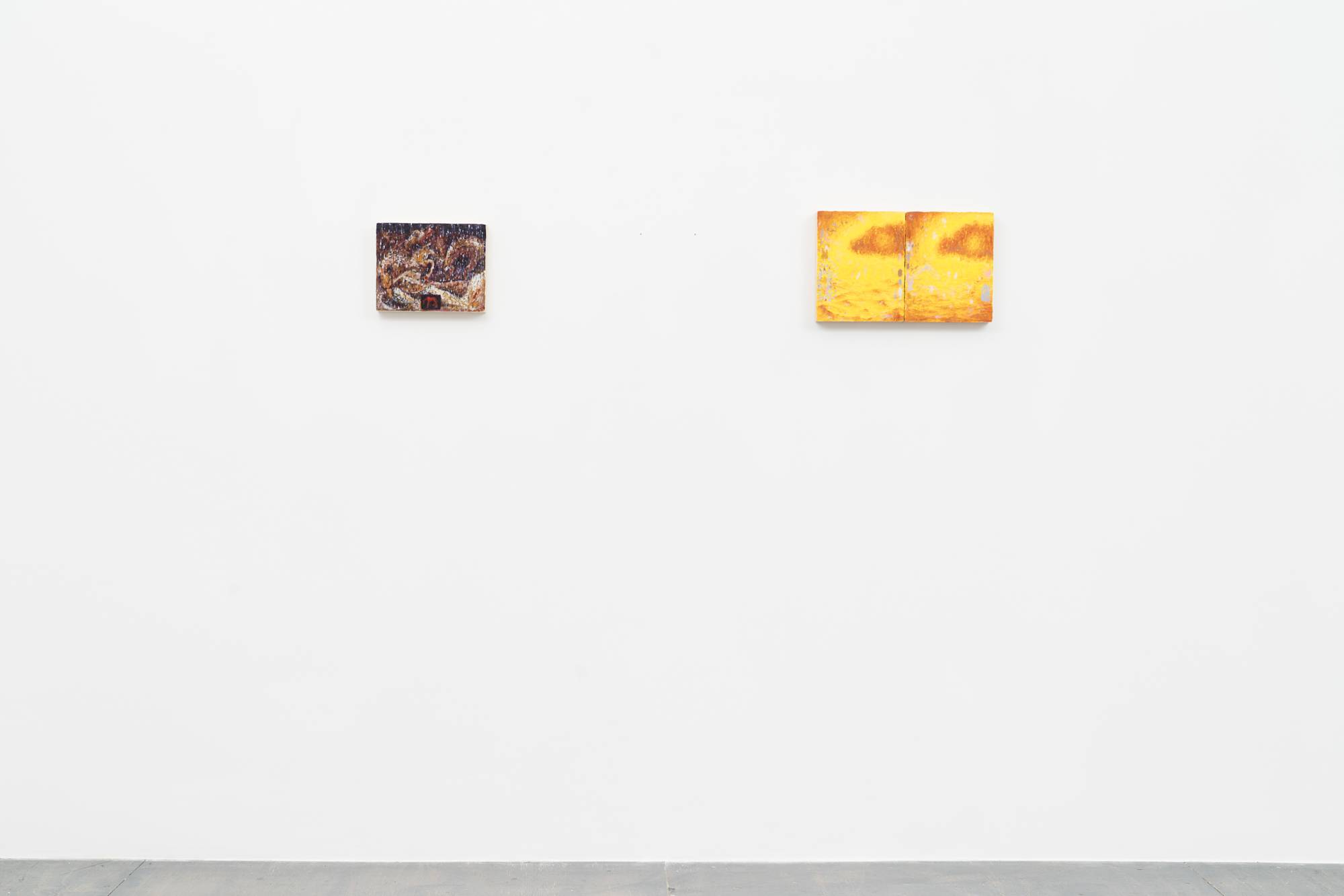 A small purple horse painting, and small yellow landscape diptych hang on the west wall of the gallery.