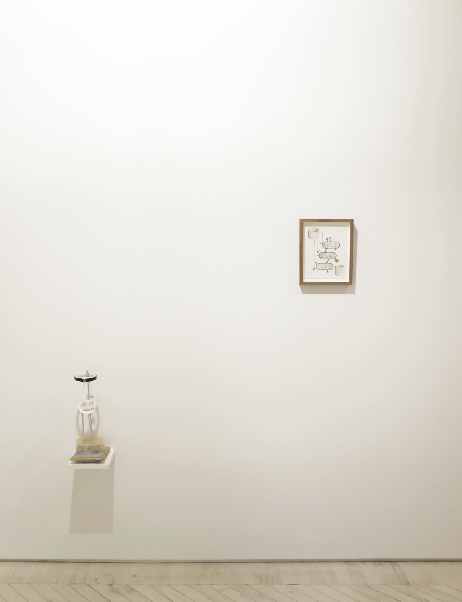 Installation view: Allison Branham, basement huge and white with a thousand tables, 2014; Natasha Ghosn, 2 of Cups, 2013 - small sculpture on a wall shelf and small graphite drawing on the wall.