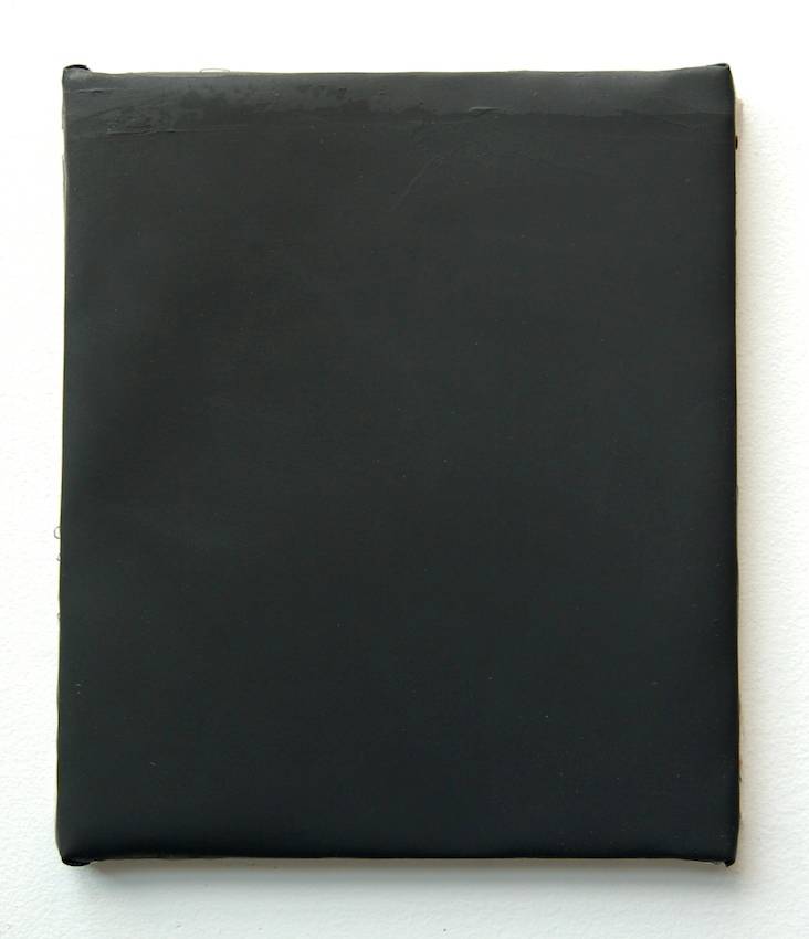 Small all black painting.