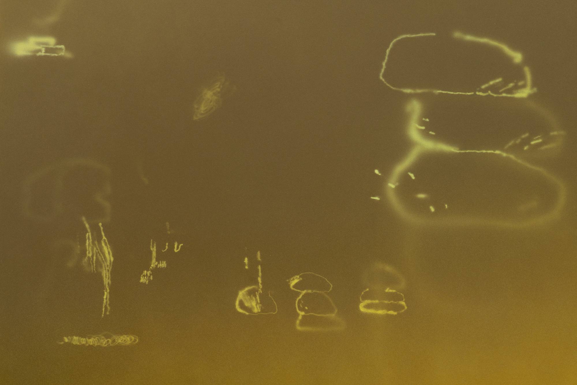 A close-up shot of a series of airbrush marks in an abstract painting.