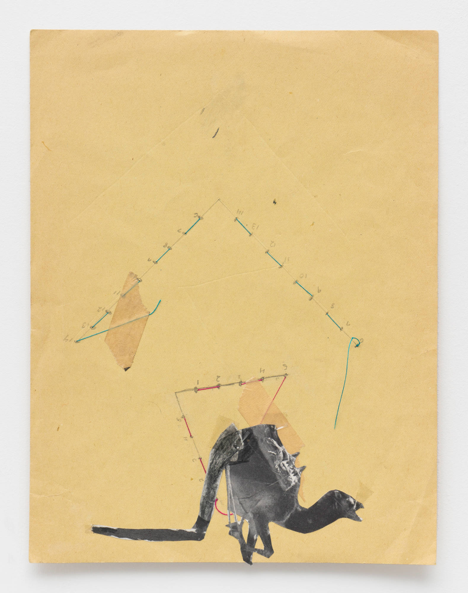 A black and white collage of a disfigured camel is mounted to a sheet of dark yellow construction paper. Two triangles are constructed by stitching blue and red thread through the sheet of paper.
