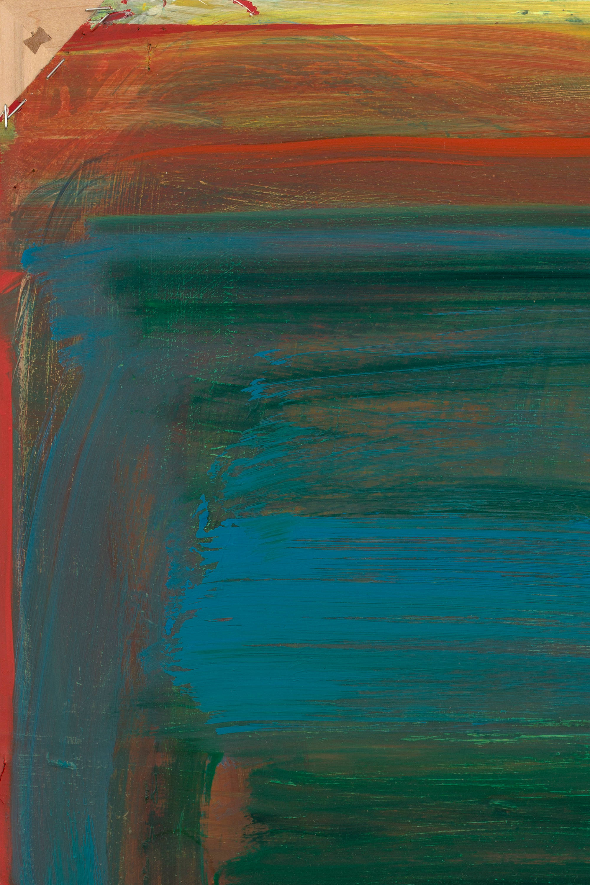 Detail of a painting in hues of green, cyan, red, and yellow that swirl rigidly, guided by its borders. The top left corner of the canvas is clipped revealing the wooden frame underneath.
