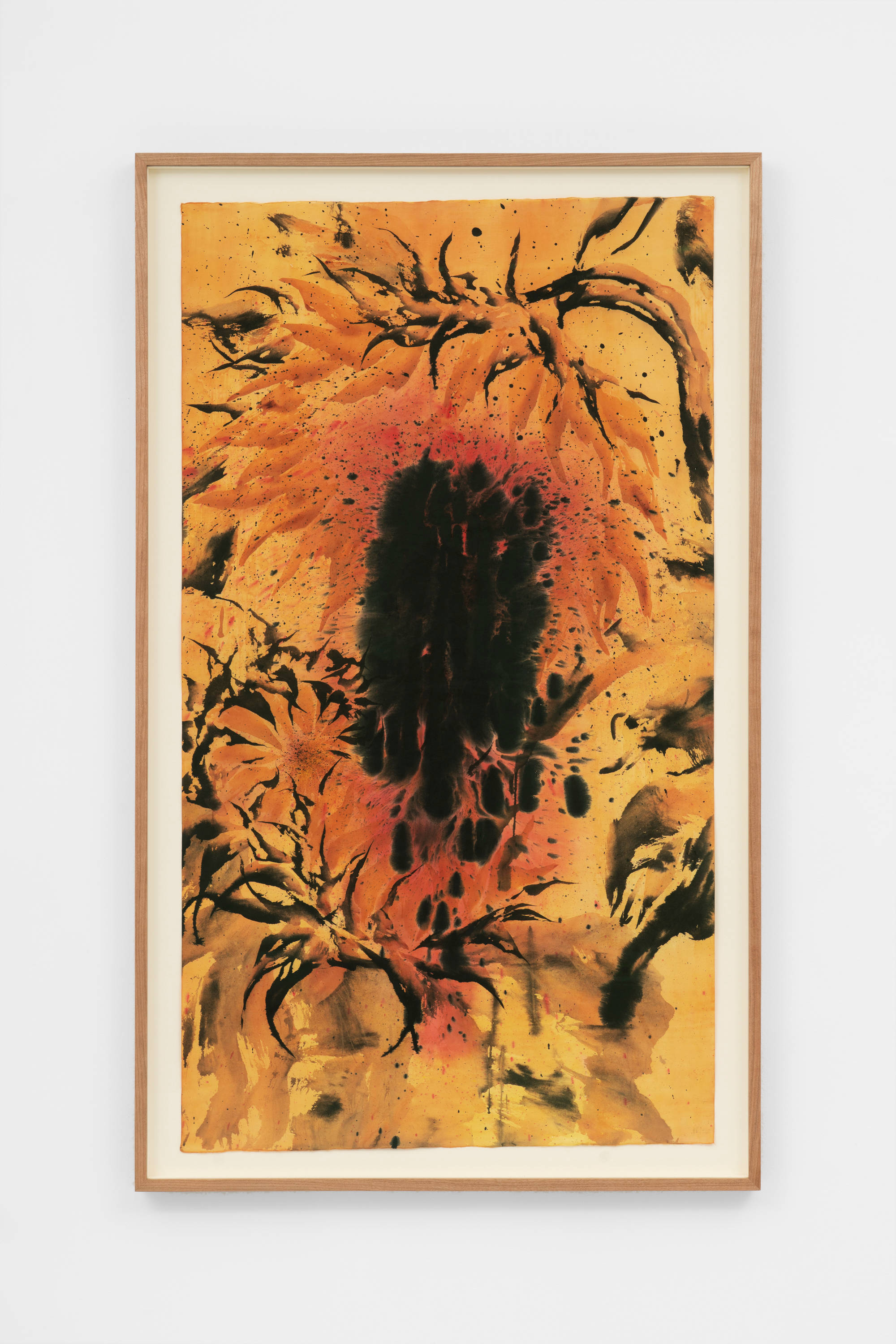 An ink painting of two orange-ochre sunflowers: one at the top right of the composition, its head bending down towards the other; the other flower is in the middle-left of the composition. The heads of each sunflower are surrounded by black leaves. The two sunflowers are united by a black mass of ink that spills from one center of the sunflower to the other.