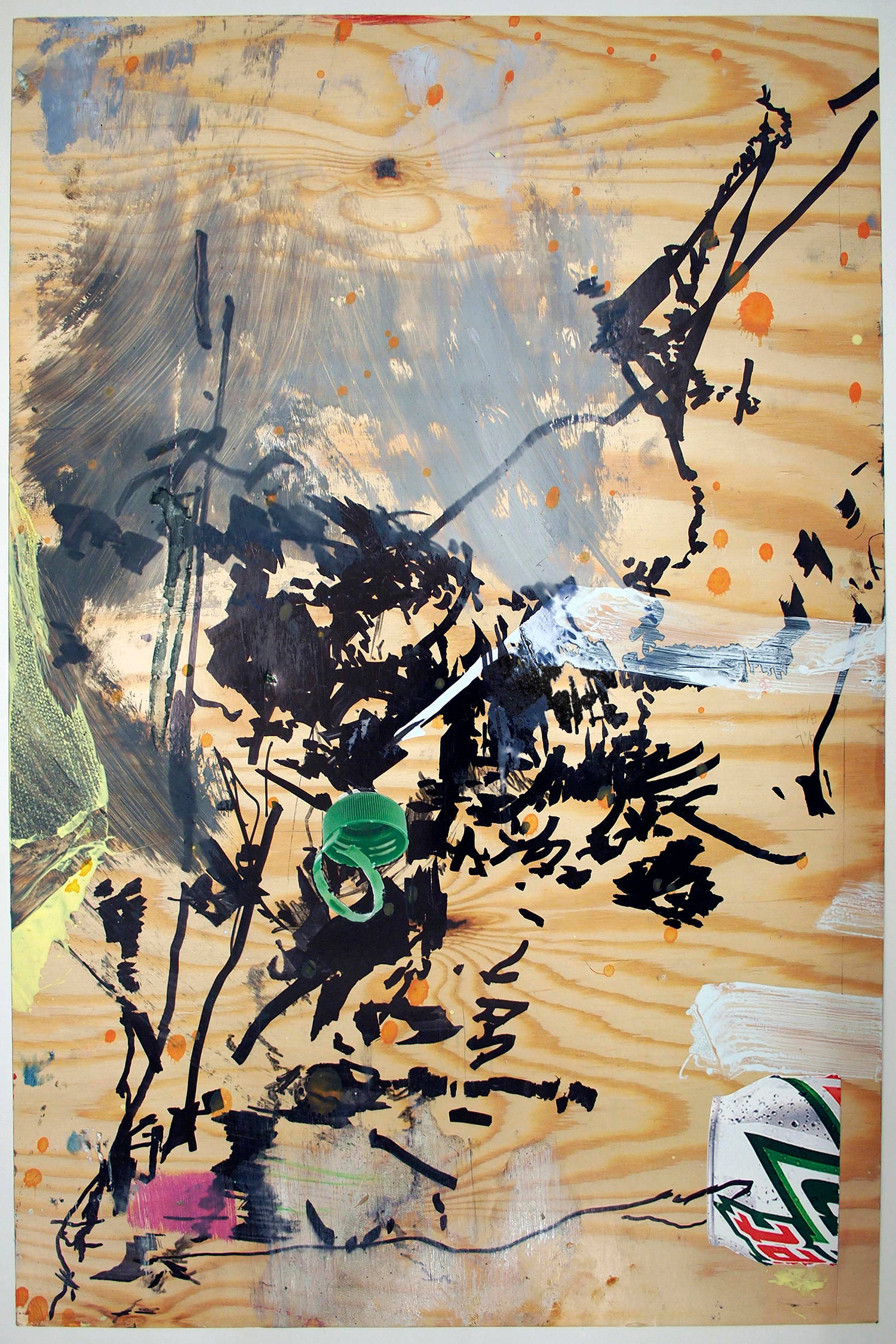 An abstract drawing depicting a series of gestural marks made by a brush. The majority of the marks are rendered in black. There is a partial cut-out of a Mountain Dew can and a bottle cap. The background resembles natural wood.