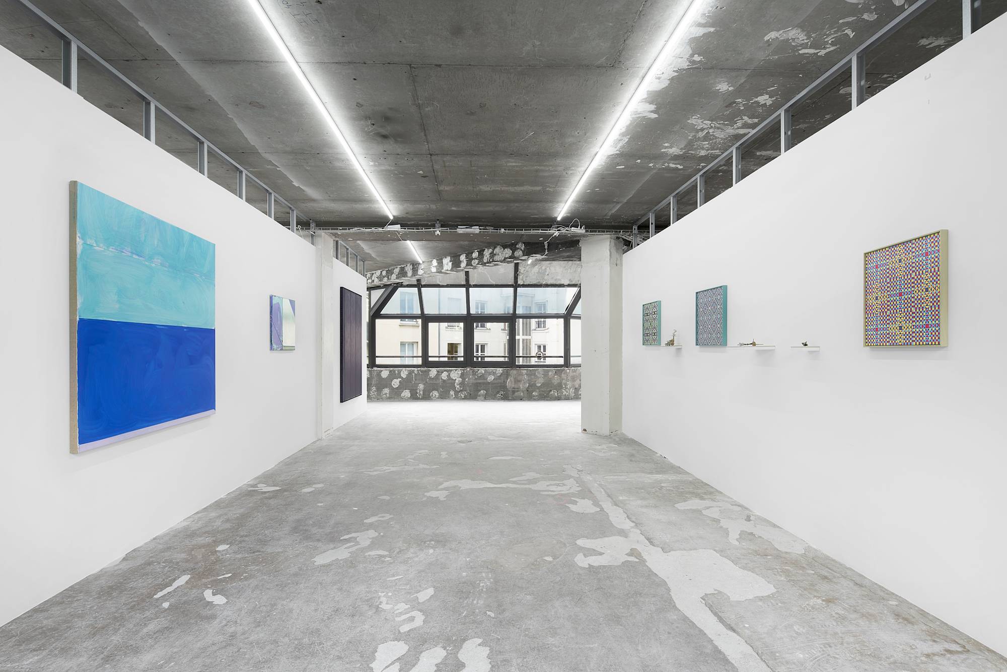 Installation view of the Paris Internationale fair in 2022 with works by Matt Hoyt and Julia Rommel