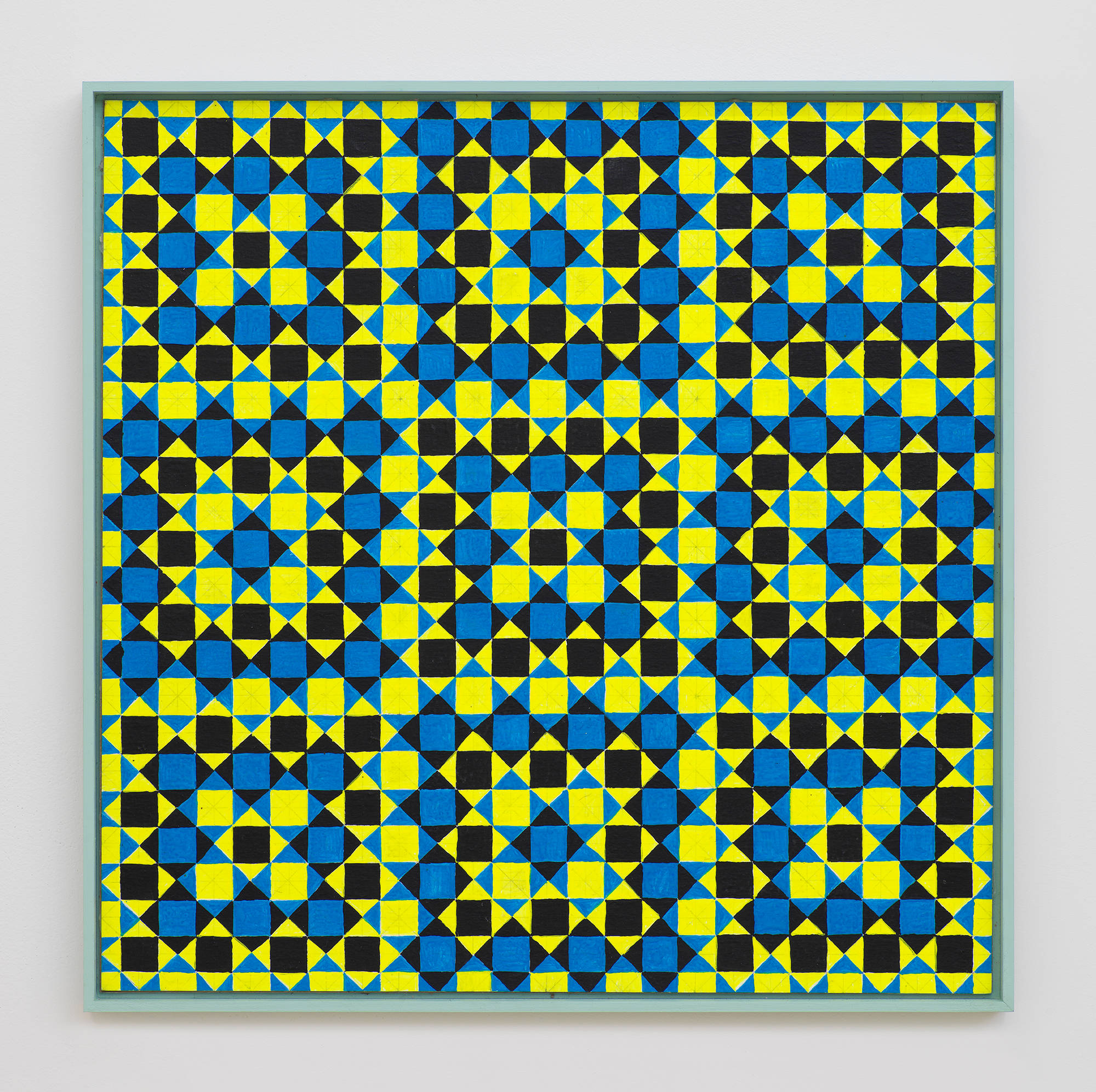 On a white wall a painting depicting a grid of crisscrossing lines generating many repeating rectangles, and triangles. The dominant colors are hues of green, yellow, blue, and black. The frame is painted green.