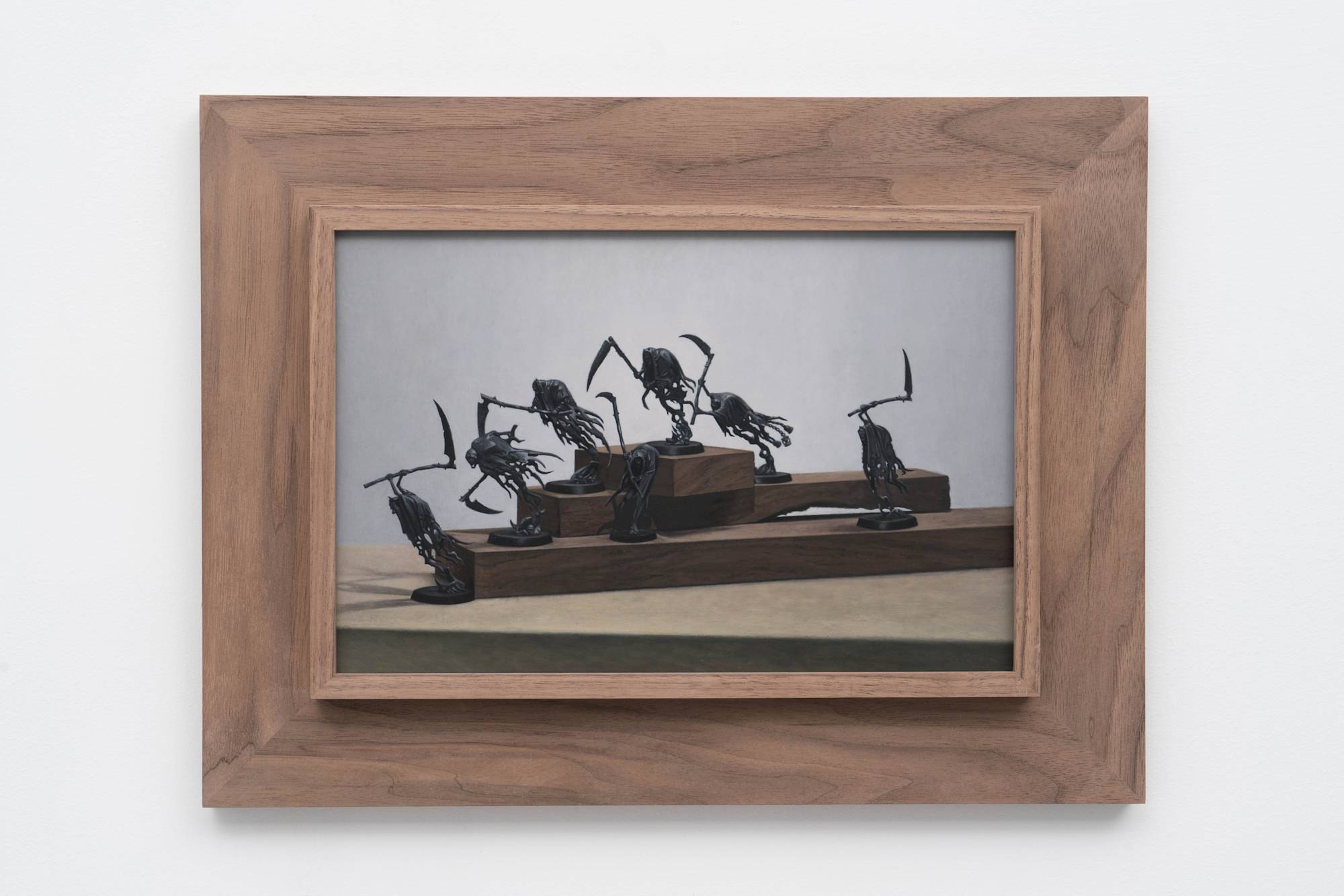 Ian Miyamura painting depicting seven unpainted Warhammer figures against a light grey background arranged on 3 tiers of wood blocks.