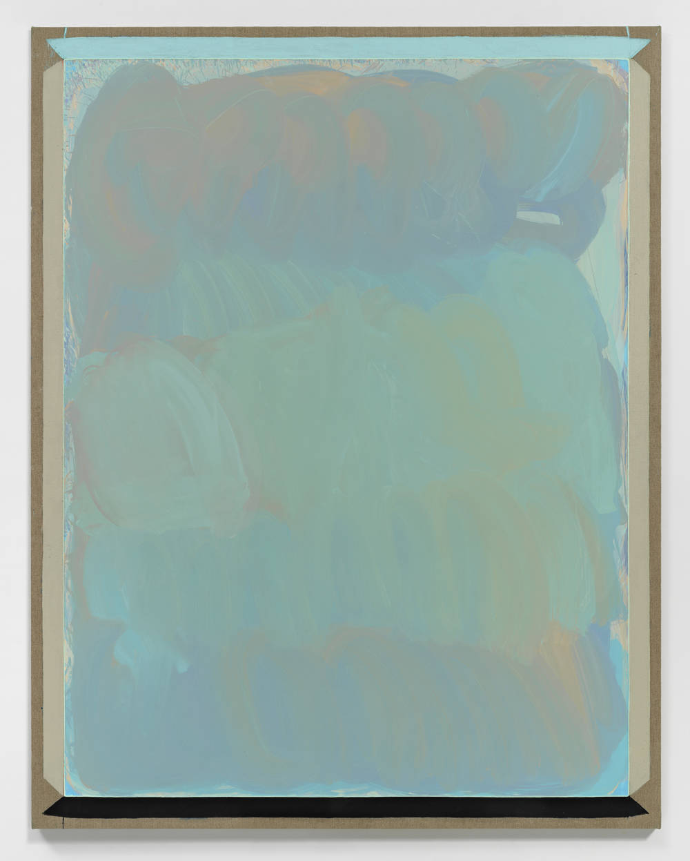 A large abstract painting with a washy surface and exposed linen around the edges.