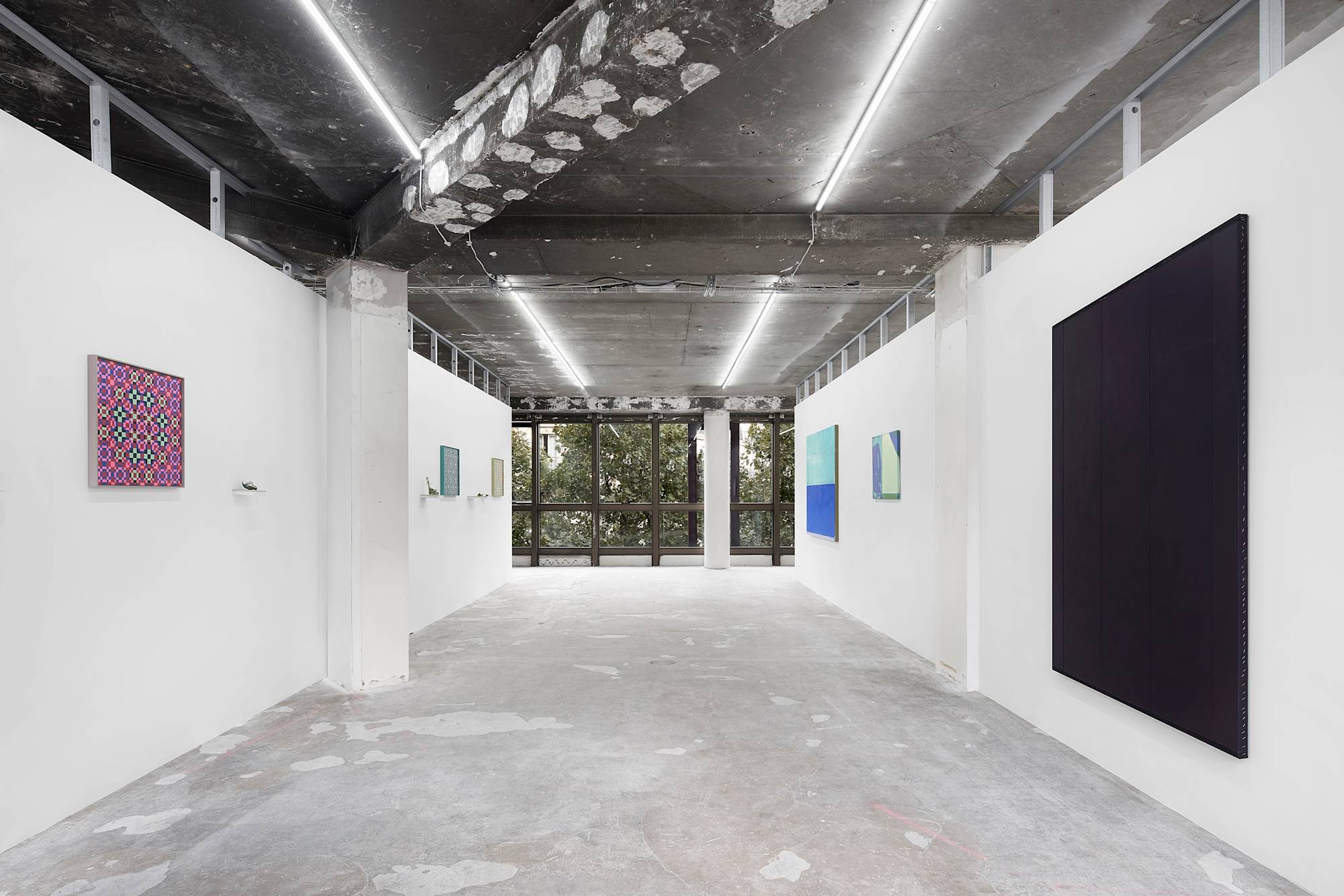 Installation view of the Paris Internationale fair in 2022 with works by Matt Hoyt and Julia Rommel