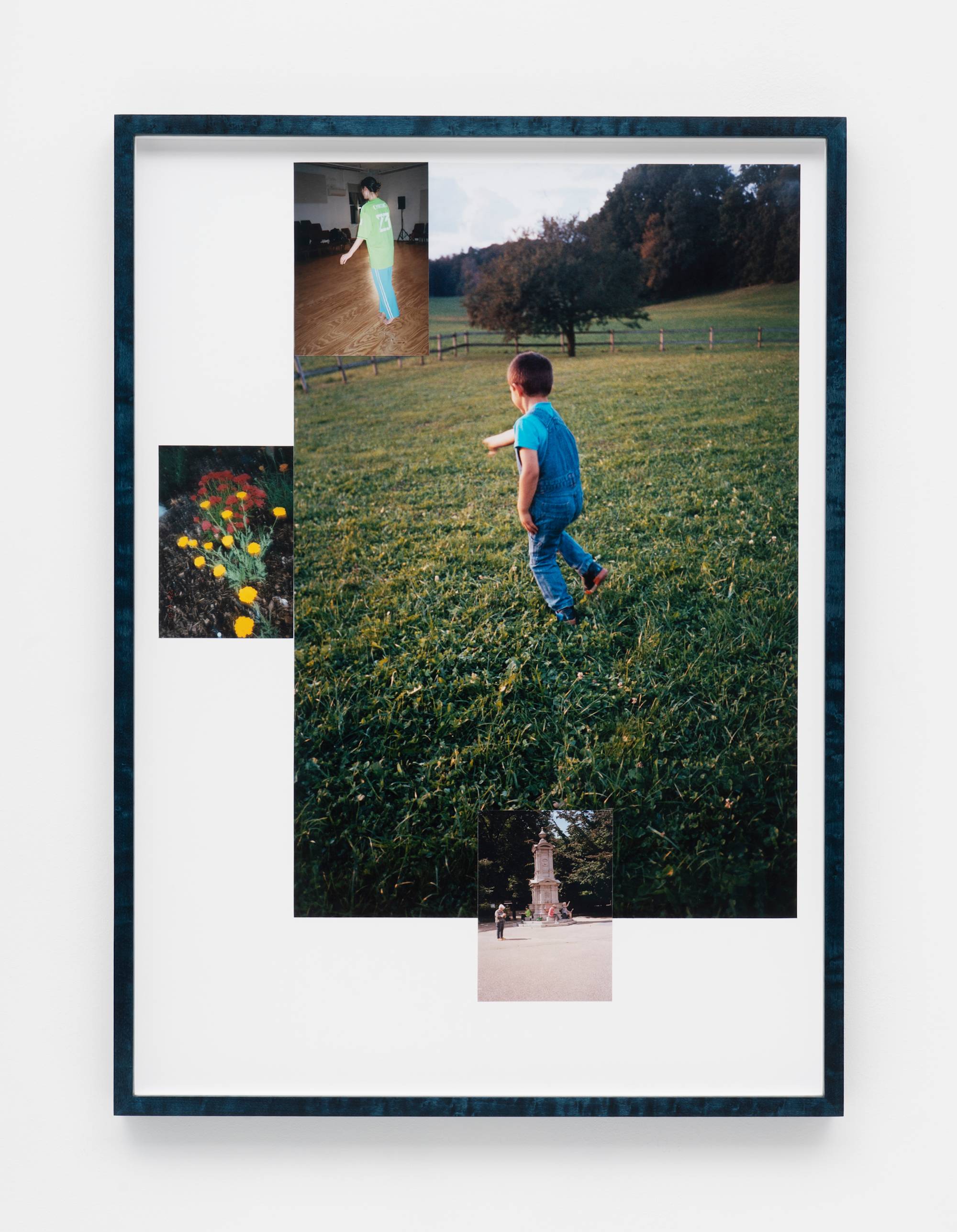 In a wood frame, a series of photographs and mementos are arranged together.