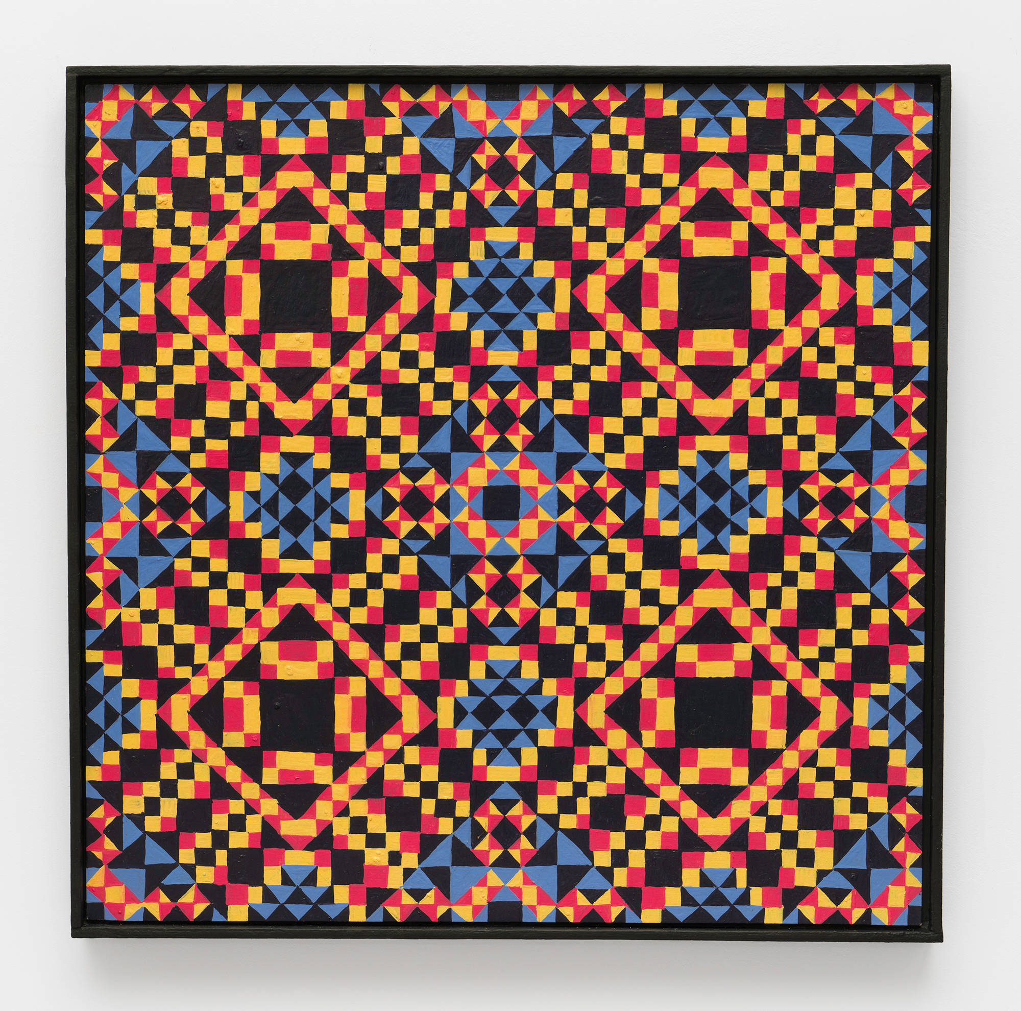 A colorful, symmetrical, geometric painting on board consisting of a pattern of repeating diamonds and triangles of orange, red, blue, and black, in a black artist frame.