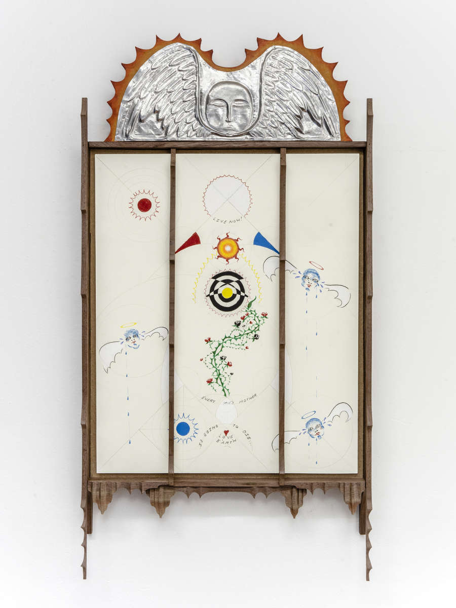 Image of Harry Gould Harvey IV drawing on paper and framed in foraged walnut wood, depicting a diagrammatic drawing with text, thorns, and angels, with a relief made in tin of an angel sitting on top, orange rays radiating out from the angel. 