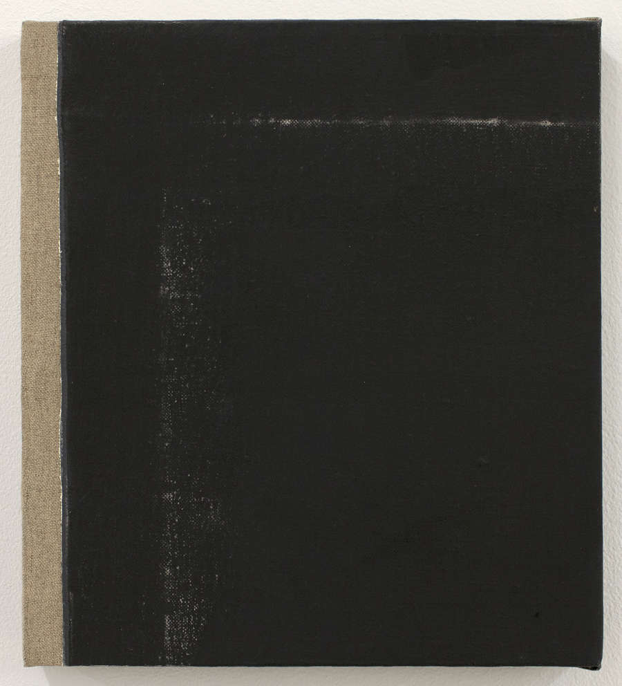 An abstract painting. A strip of raw linen runs from top to bottom along the left edge. The rest of the painting is covered in a thick layer of black paint. There are some wear marks throughout the surface of the painting. 
