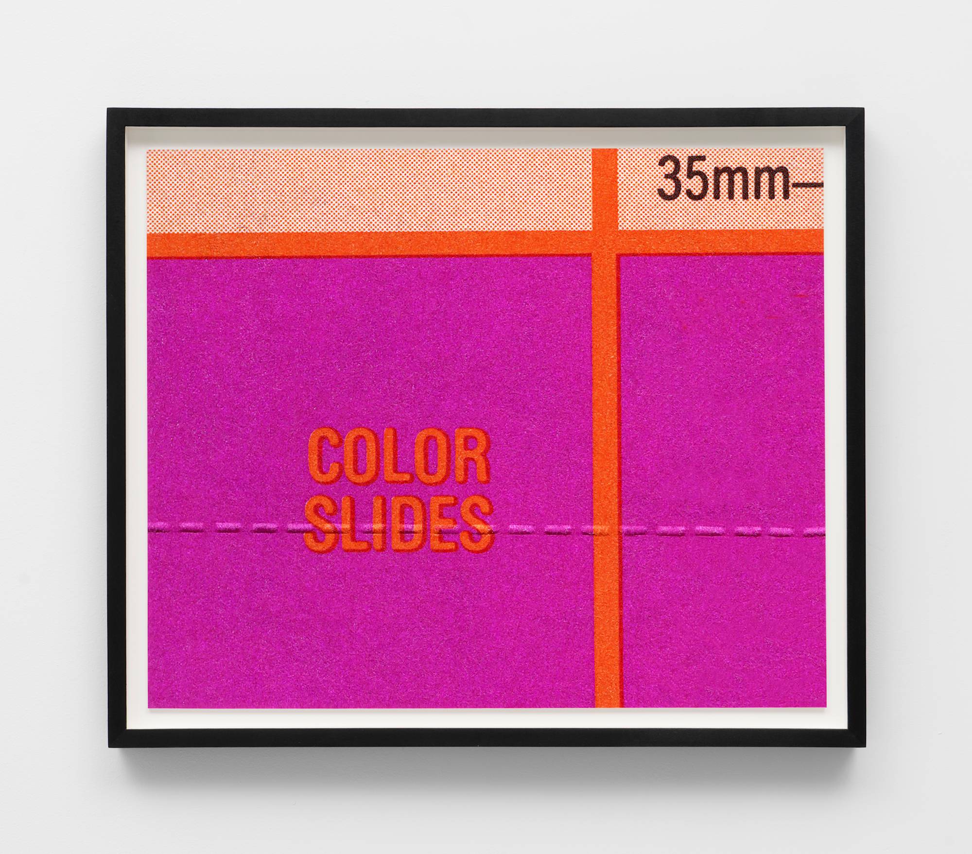 A framed photograph depicting an enlarged section of an advertisement from a mid-century magazine.
