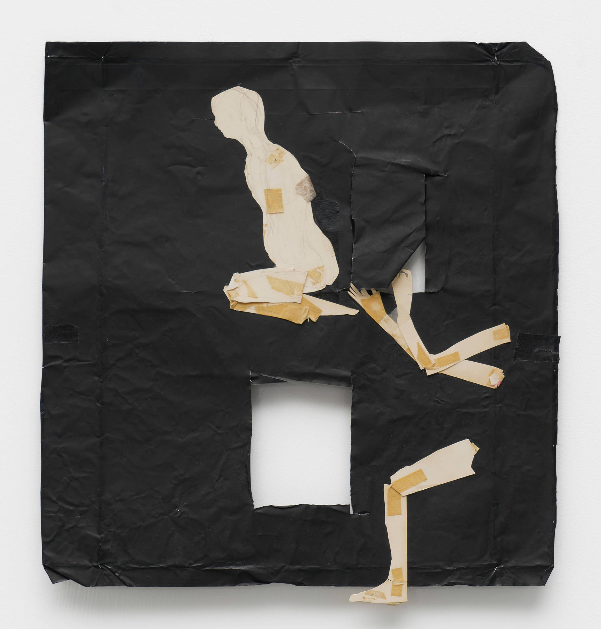 A collage on black metal foil. A square window is centered in the bottom half the artwork. The gallery wall is visible through the window. 2 semi-figures are constructed from off white paper puppet body parts.