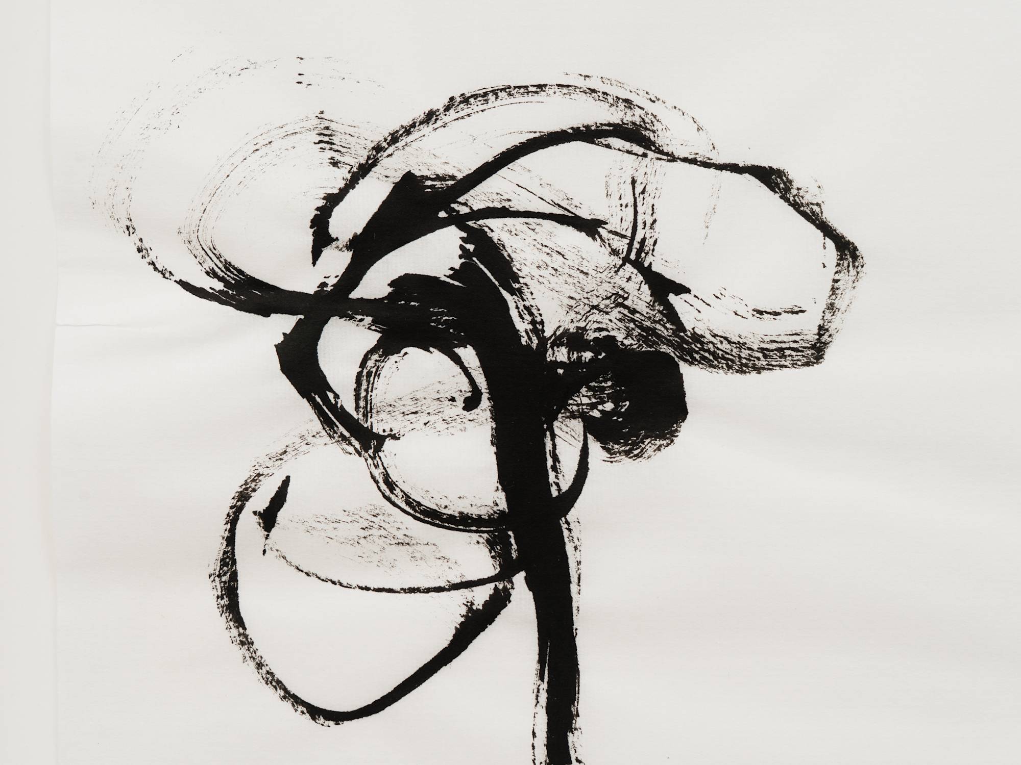 An ink painting on white paper of an abstracted flower rendered in black ink. The composition is minimal, with only gestures of petal, leaf, and stem.