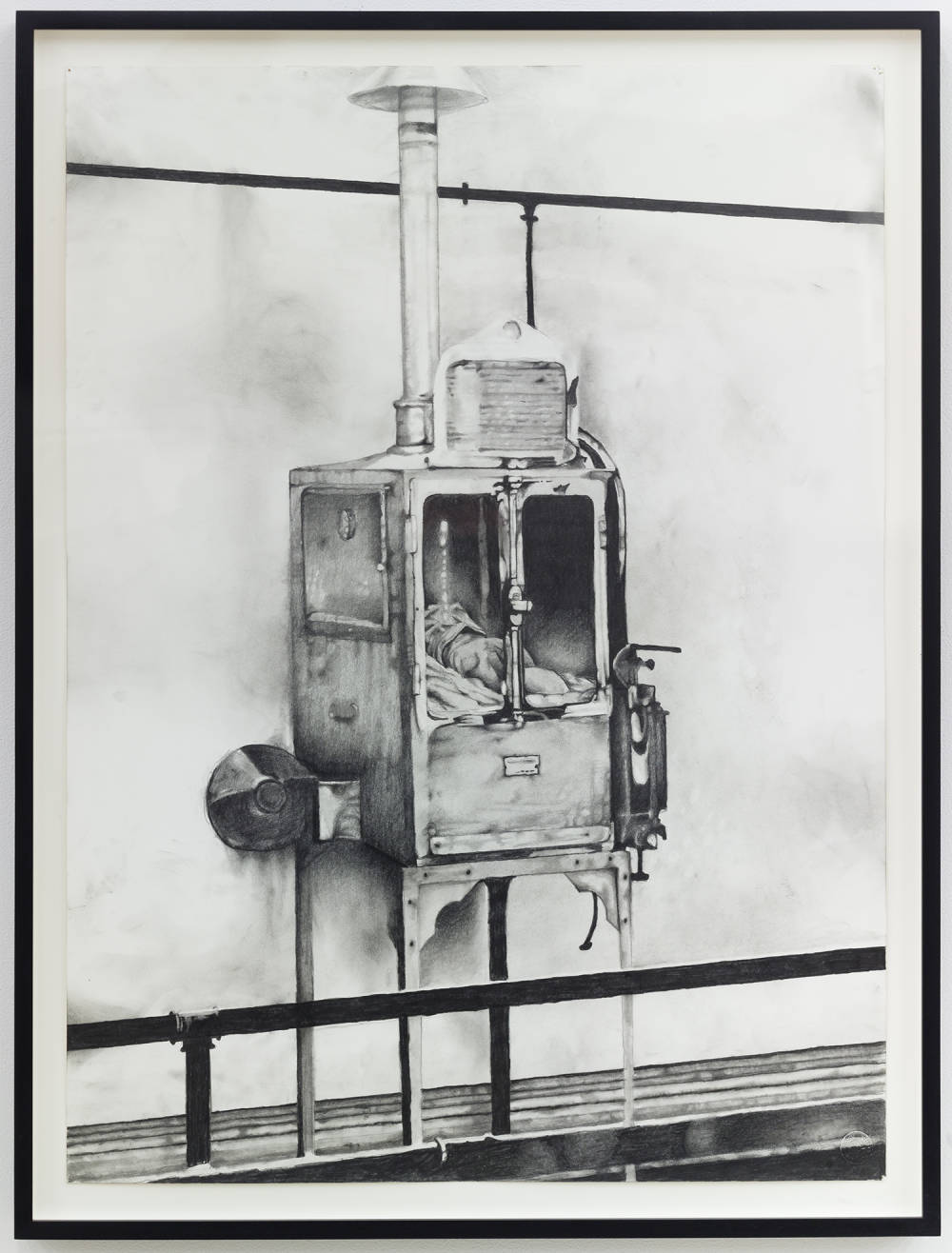 Image of a framed, detailed graphite drawing of an old industrial type object, that might be some sort of oven or cubby, which has two glass door windows  and has various pipes and attachments and is attached to the ceiling via a pipe.