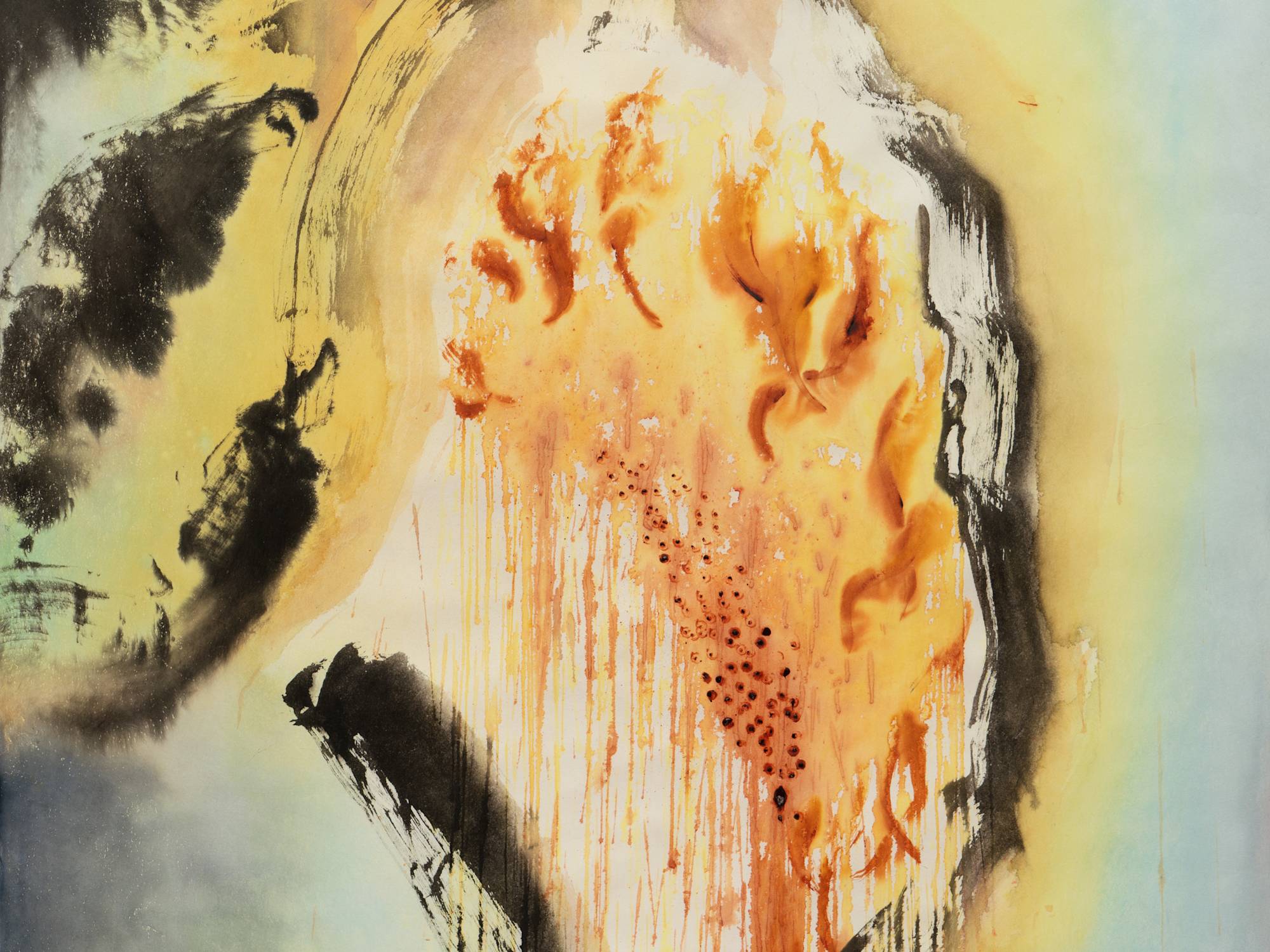 A horizontally oriented close-up shot of an ink painting of a decaying sunflower, with an orange-ochre center, green and black leaves, and washes of pale blue, purple, and blue-grey. This close-up focuses on the top of the head of the sunflower.